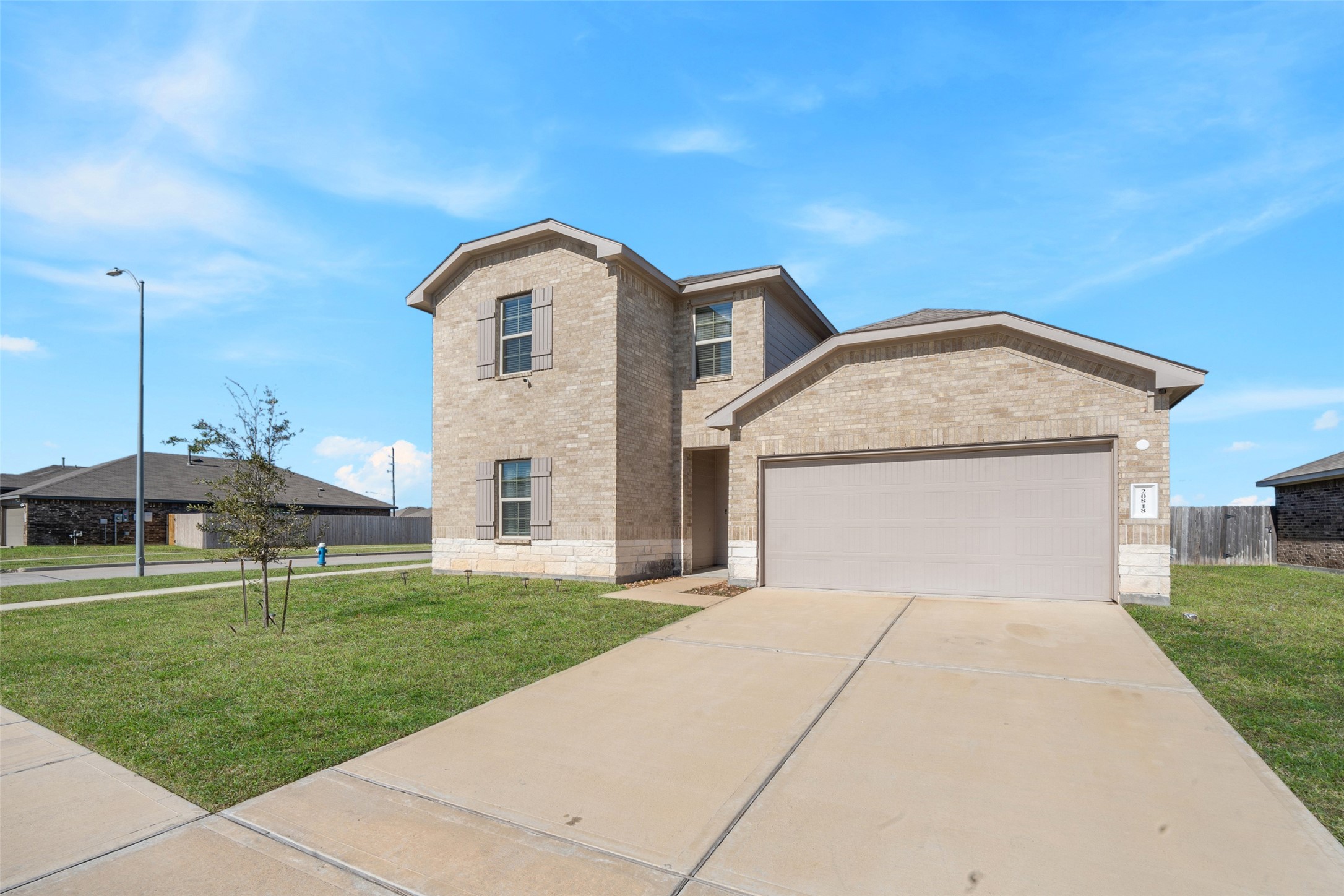 20818 Edmeston Way Katy, TX 77449 - Photo 2 of 32 a front view of a house with a yard