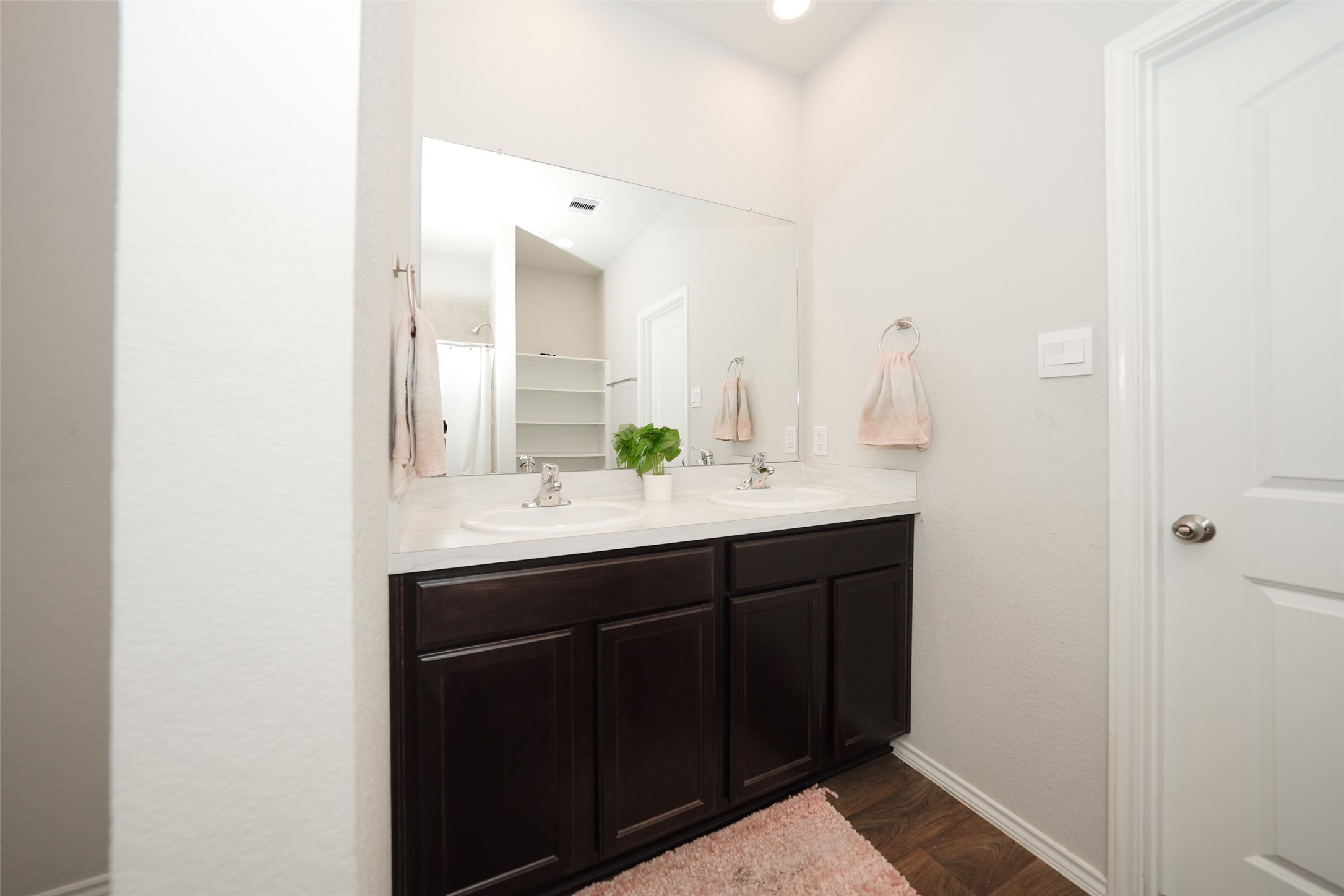 20818 Edmeston Way Katy, TX 77449 - Photo 23 of 32 a bathroom with a sink and a mirror