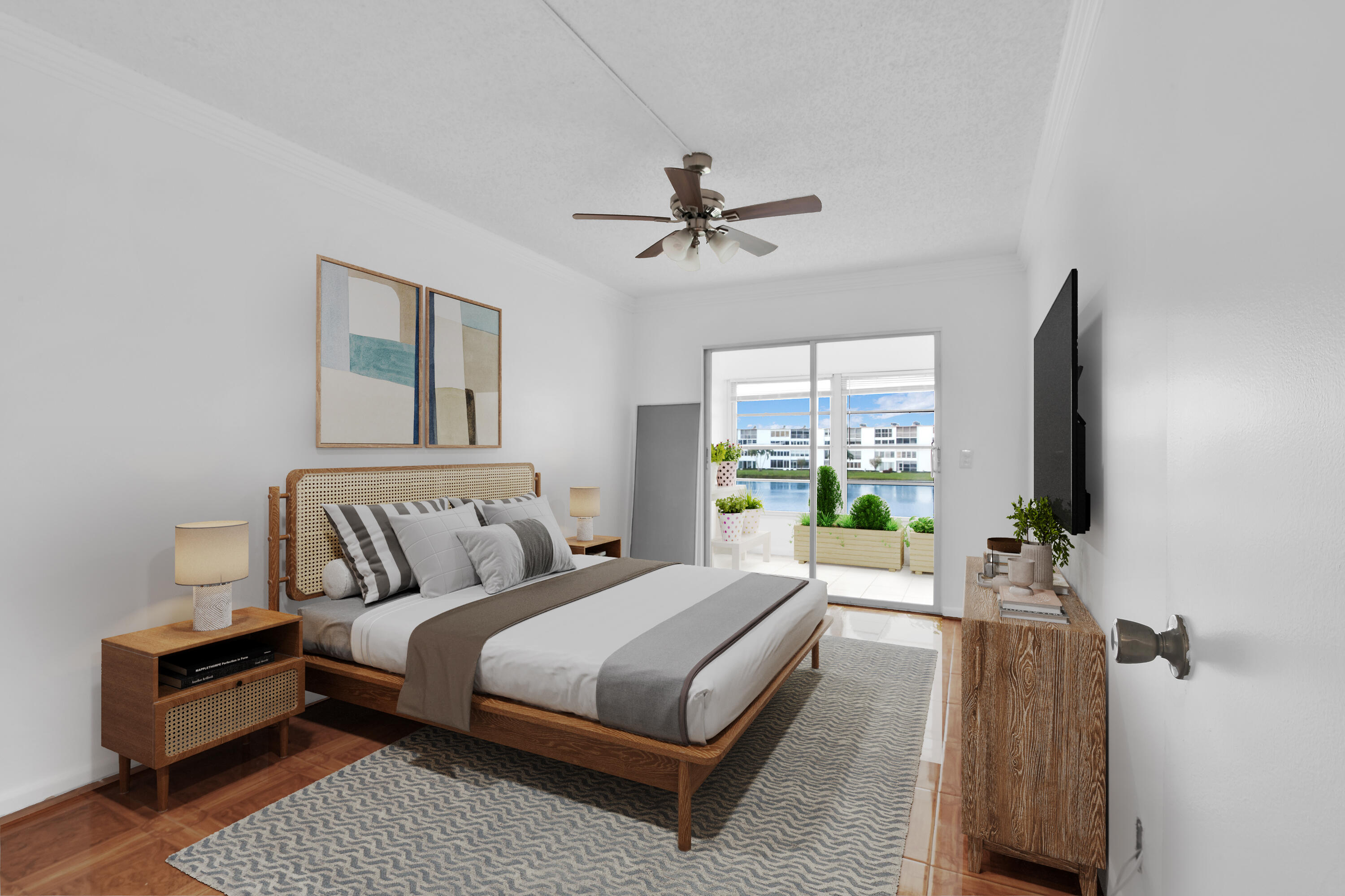 2043 Cornwall C, Unit 2043 Boca Raton, FL 33434 - Photo 13 of 22 a bedroom with a bed couch and a chandelier