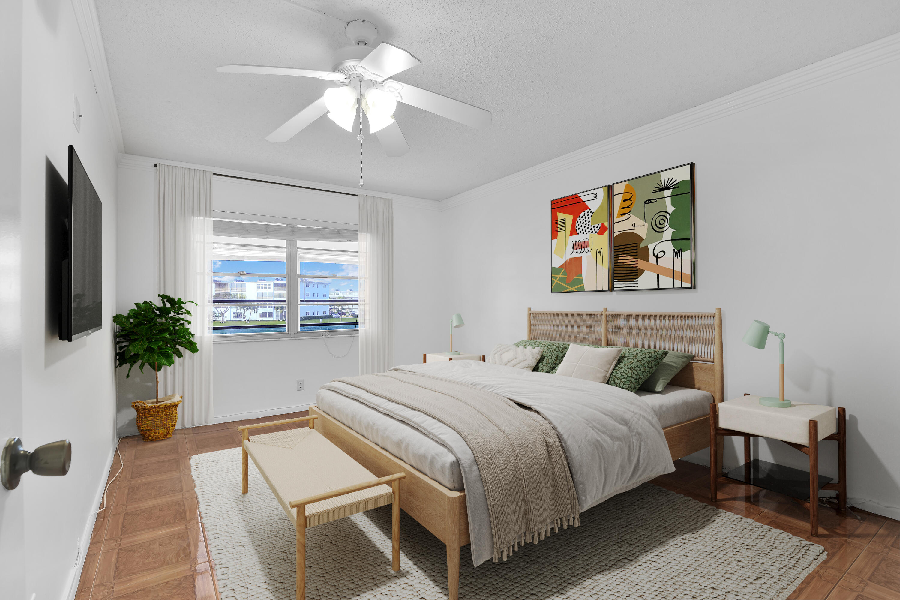 2043 Cornwall C, Unit 2043 Boca Raton, FL 33434 - Photo 15 of 22 a bedroom with a bed a dresser next to a window