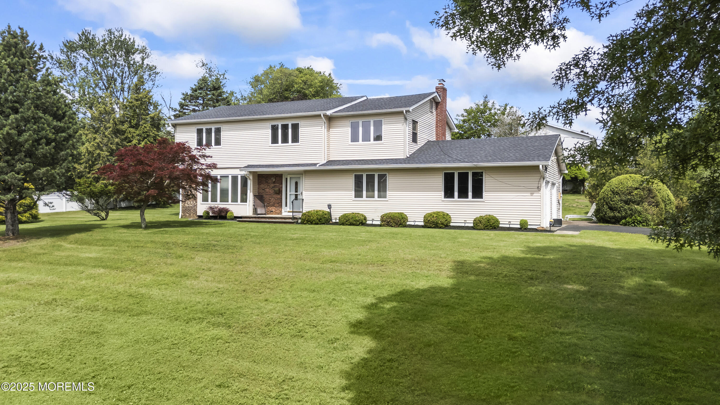 27 Sargent Road Freehold, NJ 07728 - Photo 1 of 47 a front view of a house with a garden