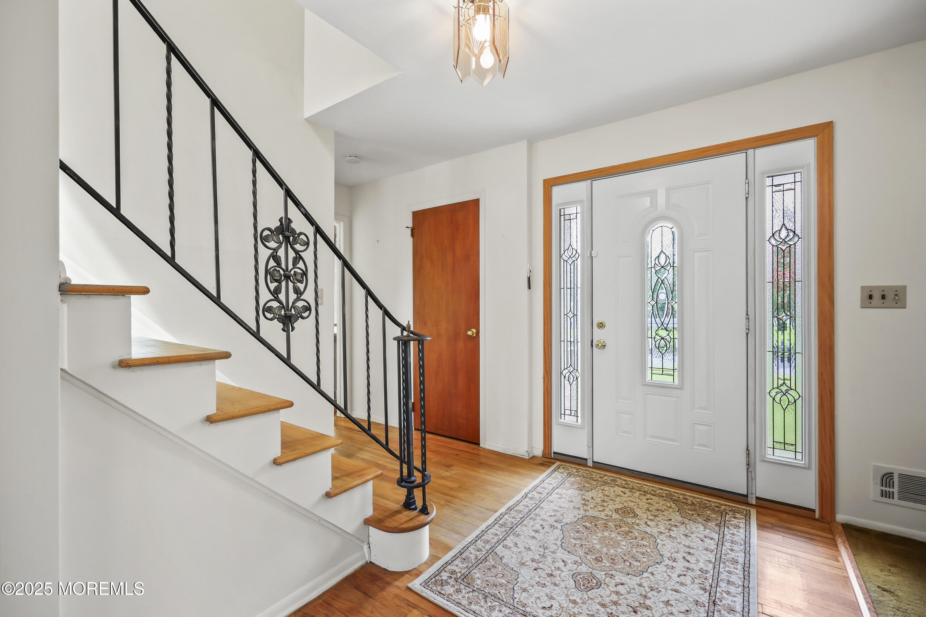 27 Sargent Road Freehold, NJ 07728 - Photo 15 of 47 a view of an entryway with wooden floor