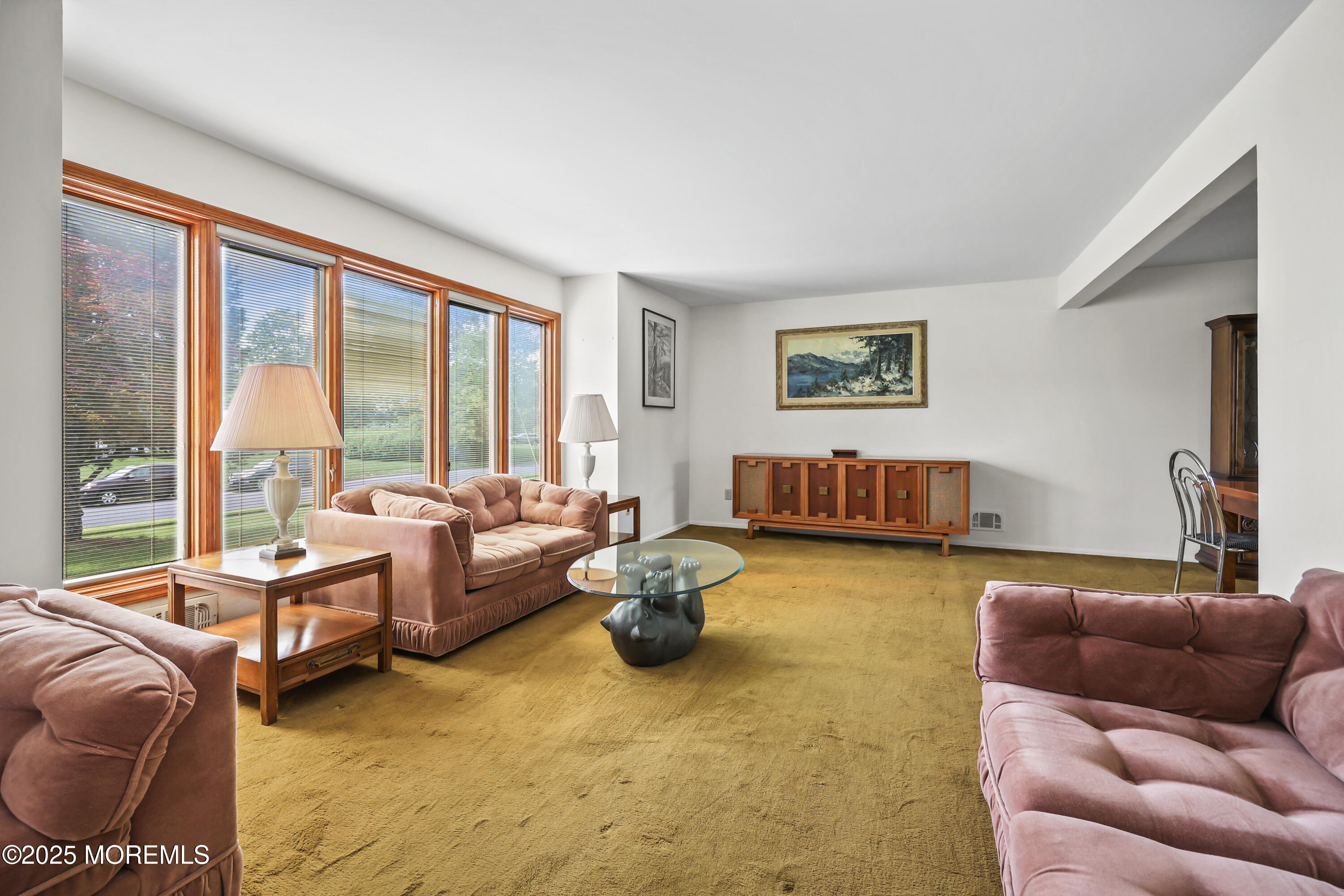 27 Sargent Road Freehold, NJ 07728 - Photo 19 of 47 a living room with furniture and a large window
