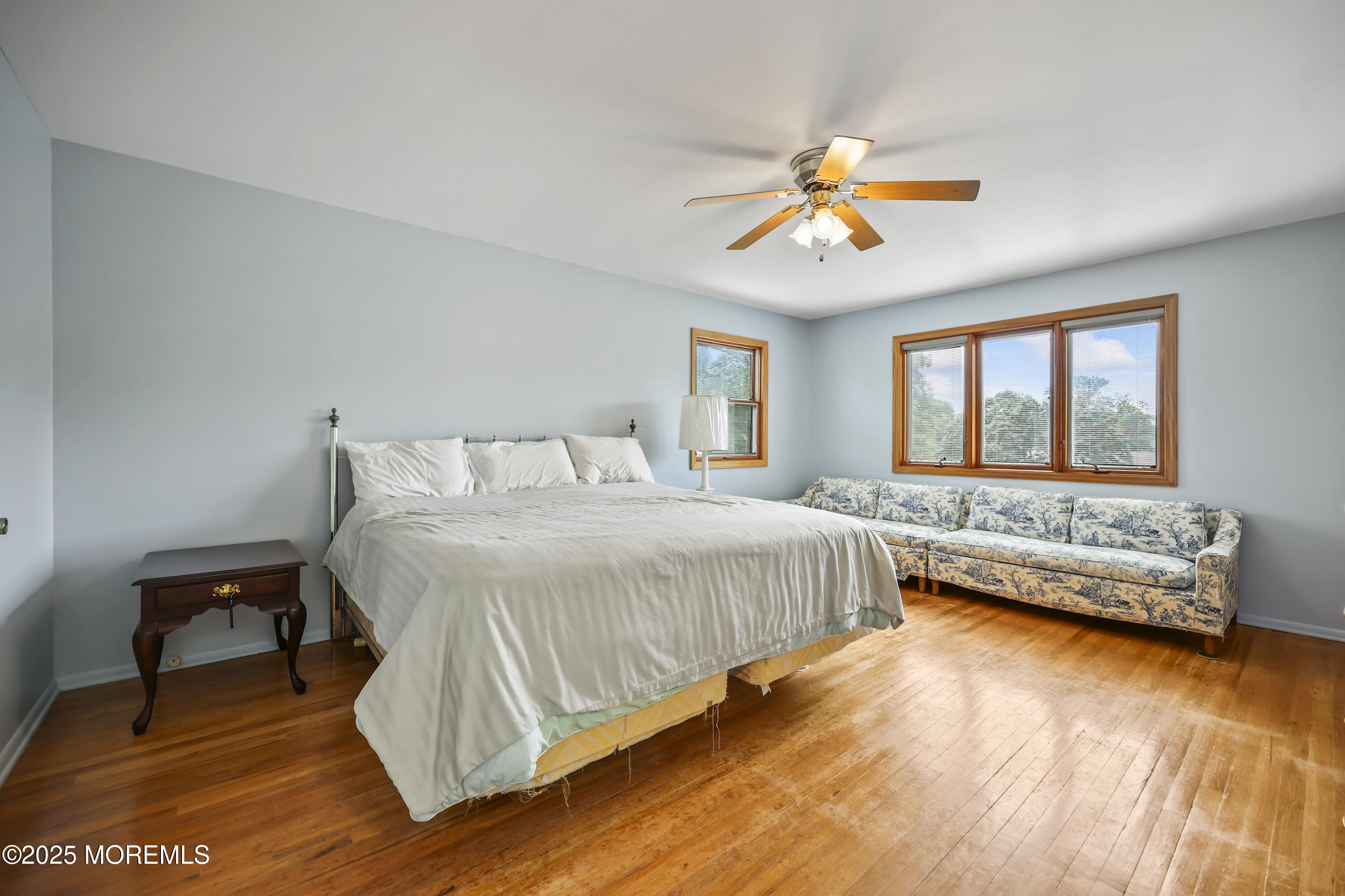 27 Sargent Road Freehold, NJ 07728 - Photo 20 of 47 a bedroom with a bed and a couch
