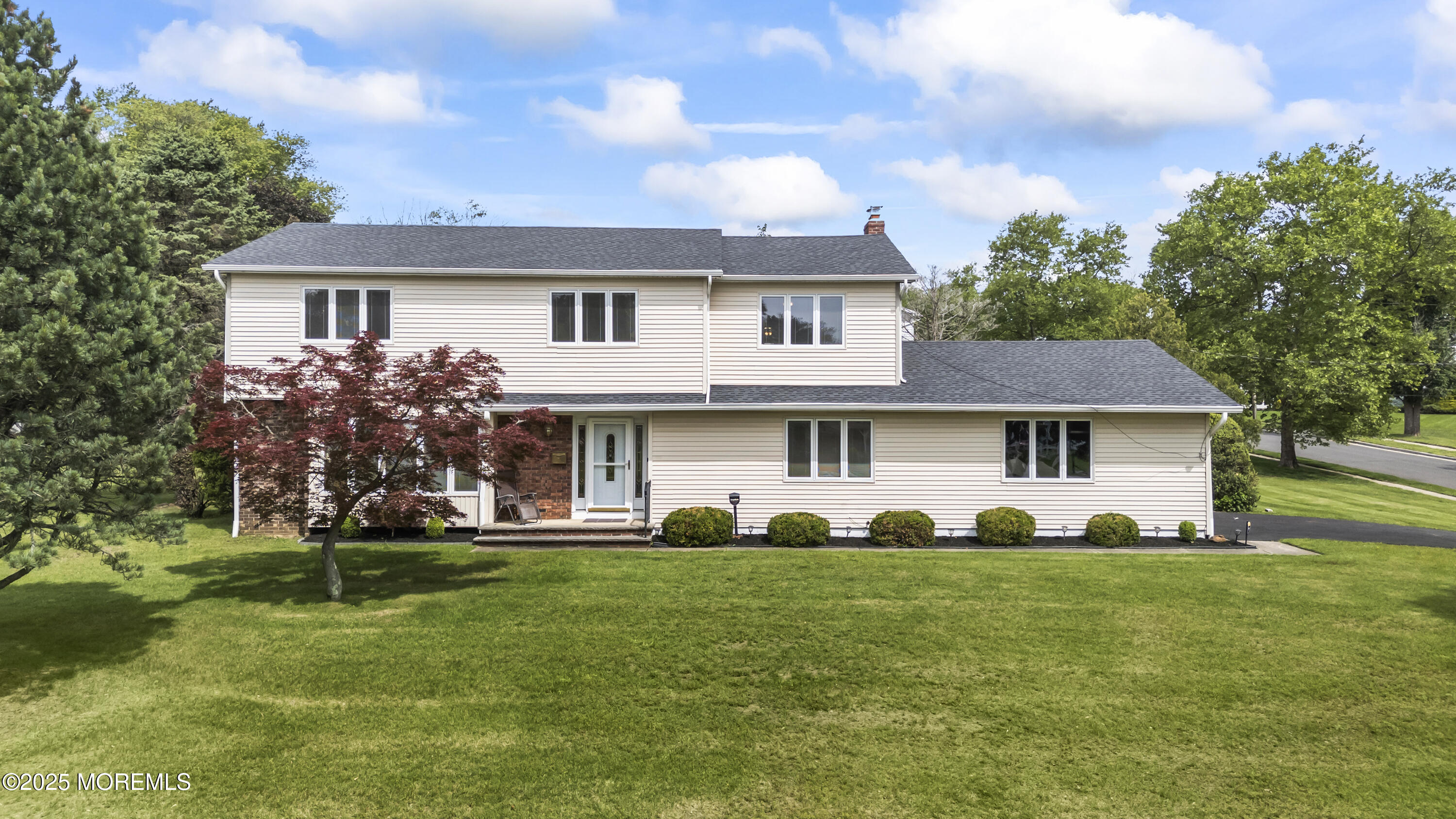 27 Sargent Road Freehold, NJ 07728 - Photo 2 of 47 a front view of a house with a yard