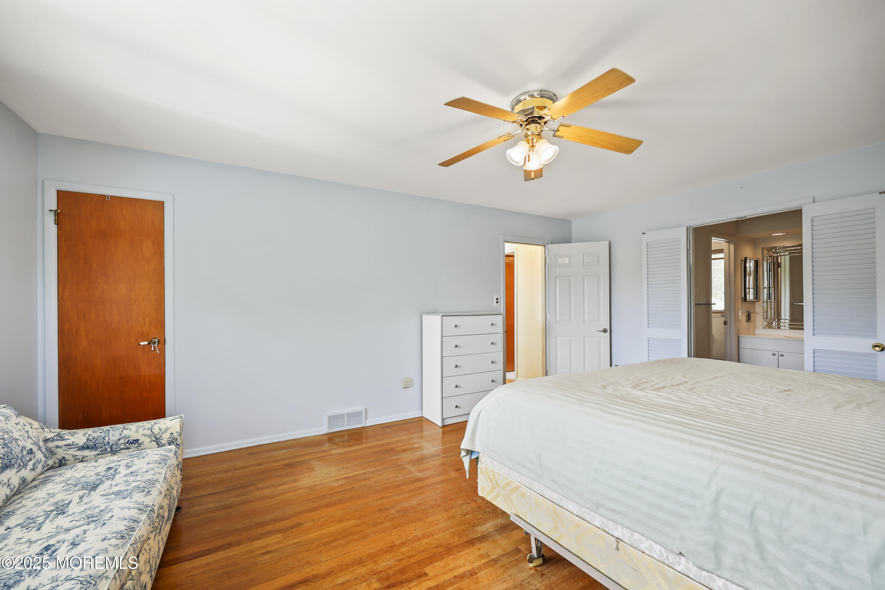 27 Sargent Road Freehold, NJ 07728 - Photo 21 of 47 a bedroom with a bed and a window