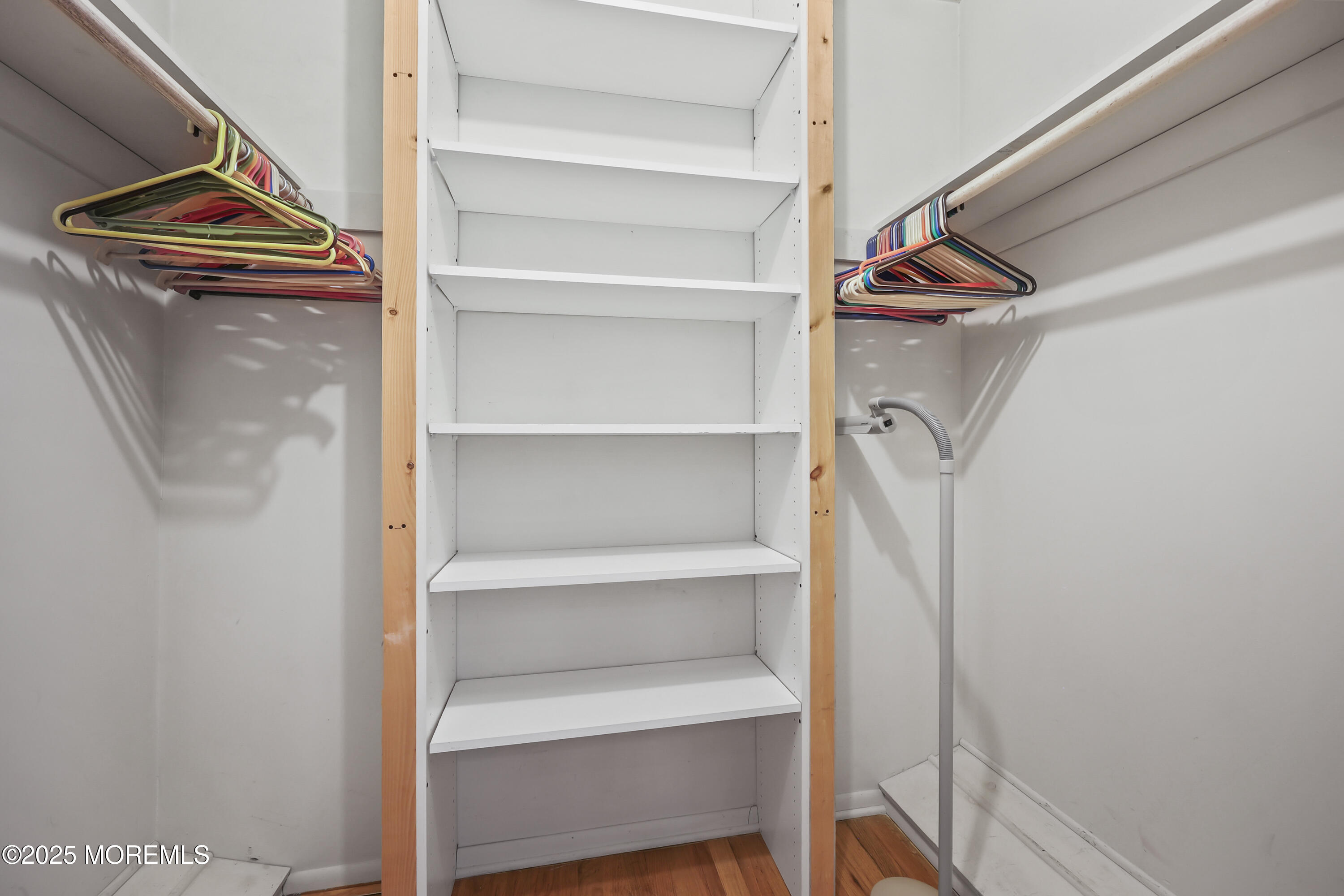 27 Sargent Road Freehold, NJ 07728 - Photo 23 of 47 a view of walk in closet with empty racks