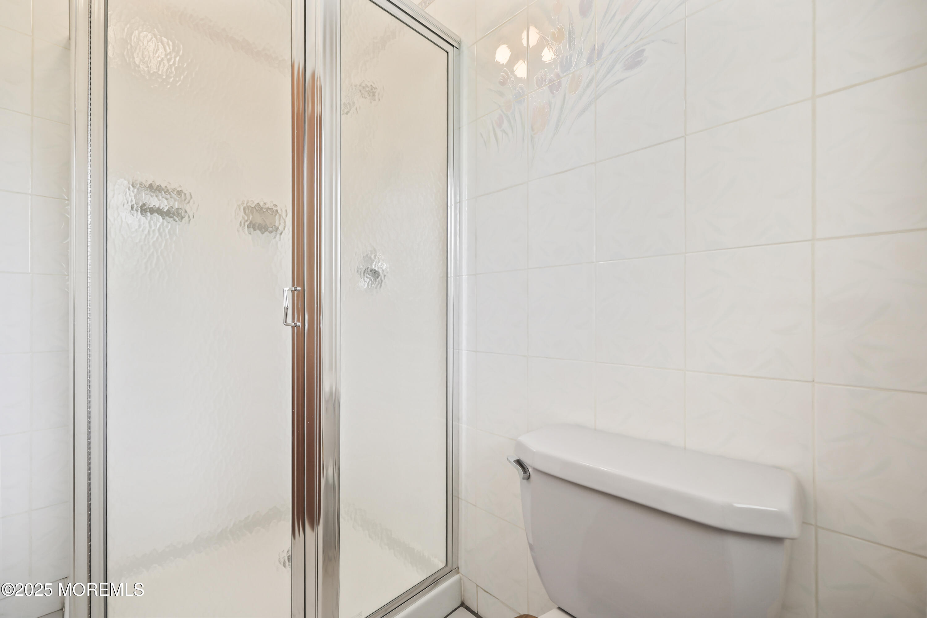 27 Sargent Road Freehold, NJ 07728 - Photo 25 of 47 a bathroom with a toilet and a shower