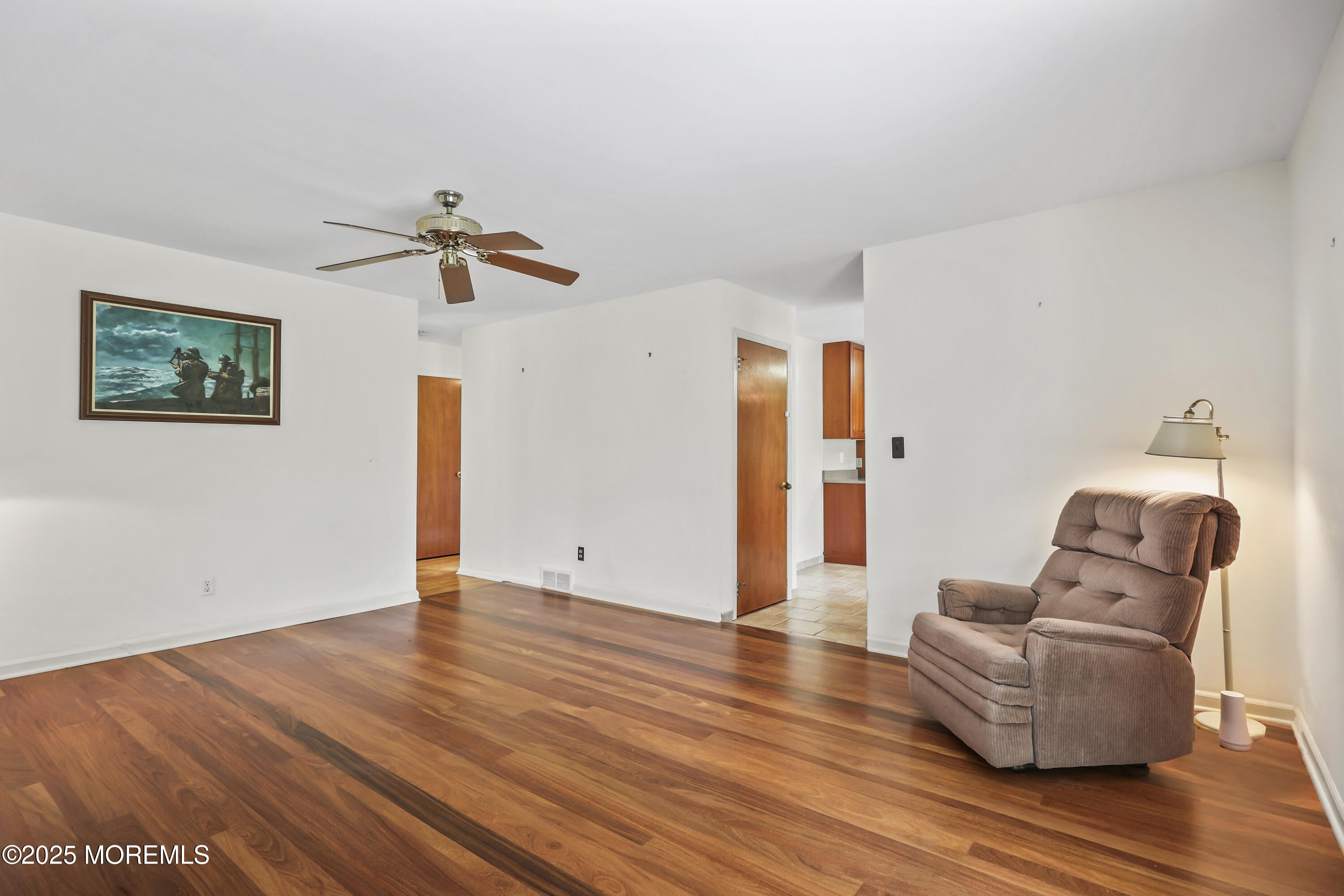 27 Sargent Road Freehold, NJ 07728 - Photo 33 of 47 a view of livingroom with furniture and wooden floor
