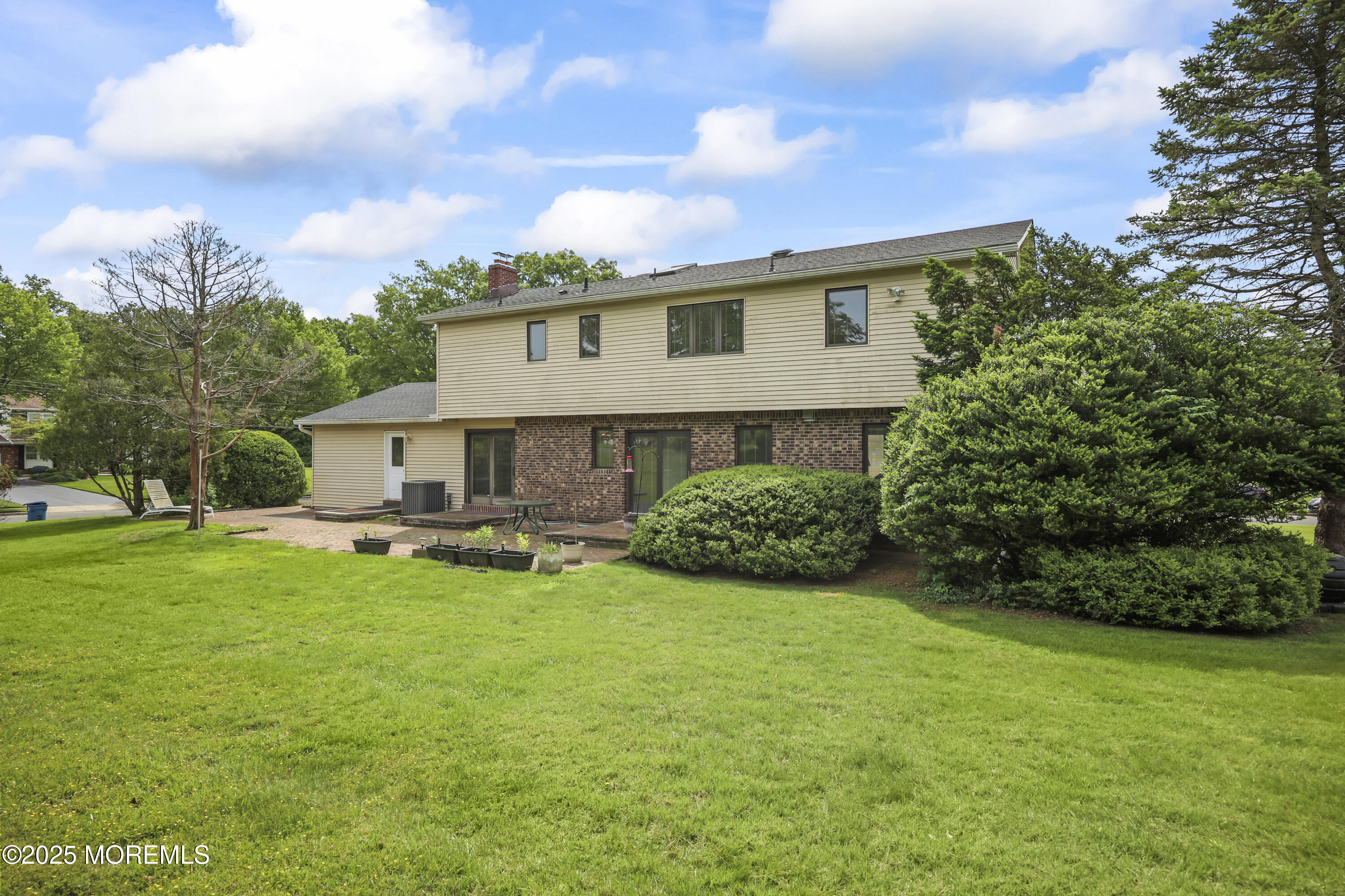 27 Sargent Road Freehold, NJ 07728 - Photo 40 of 47 a view of a house with backyard sitting area and garden