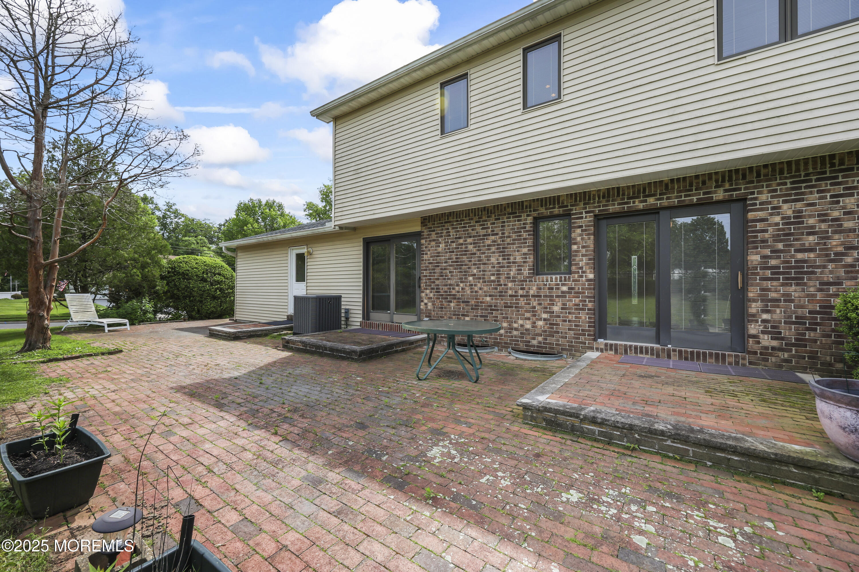 27 Sargent Road Freehold, NJ 07728 - Photo 41 of 47 a view of a house with backyard and sitting area