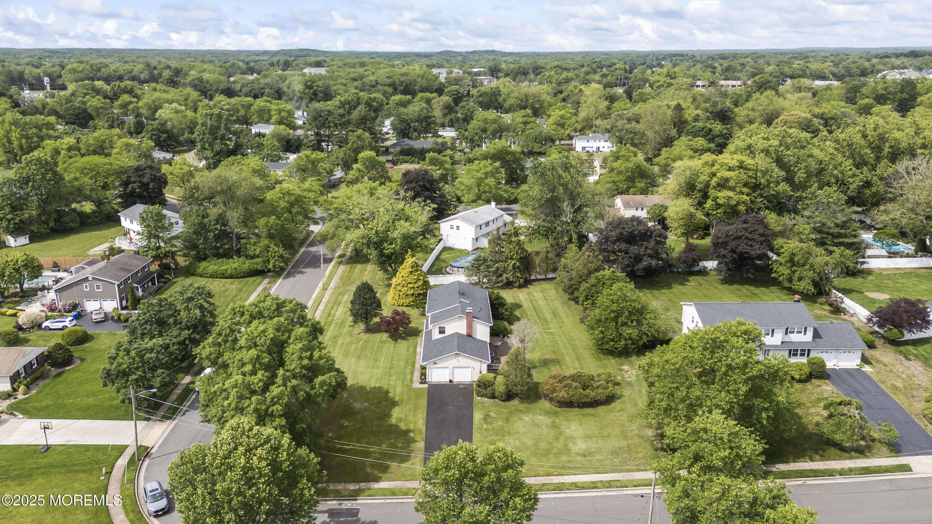 27 Sargent Road Freehold, NJ 07728 - Photo 42 of 47 an aerial view of residential houses with outdoor space and trees