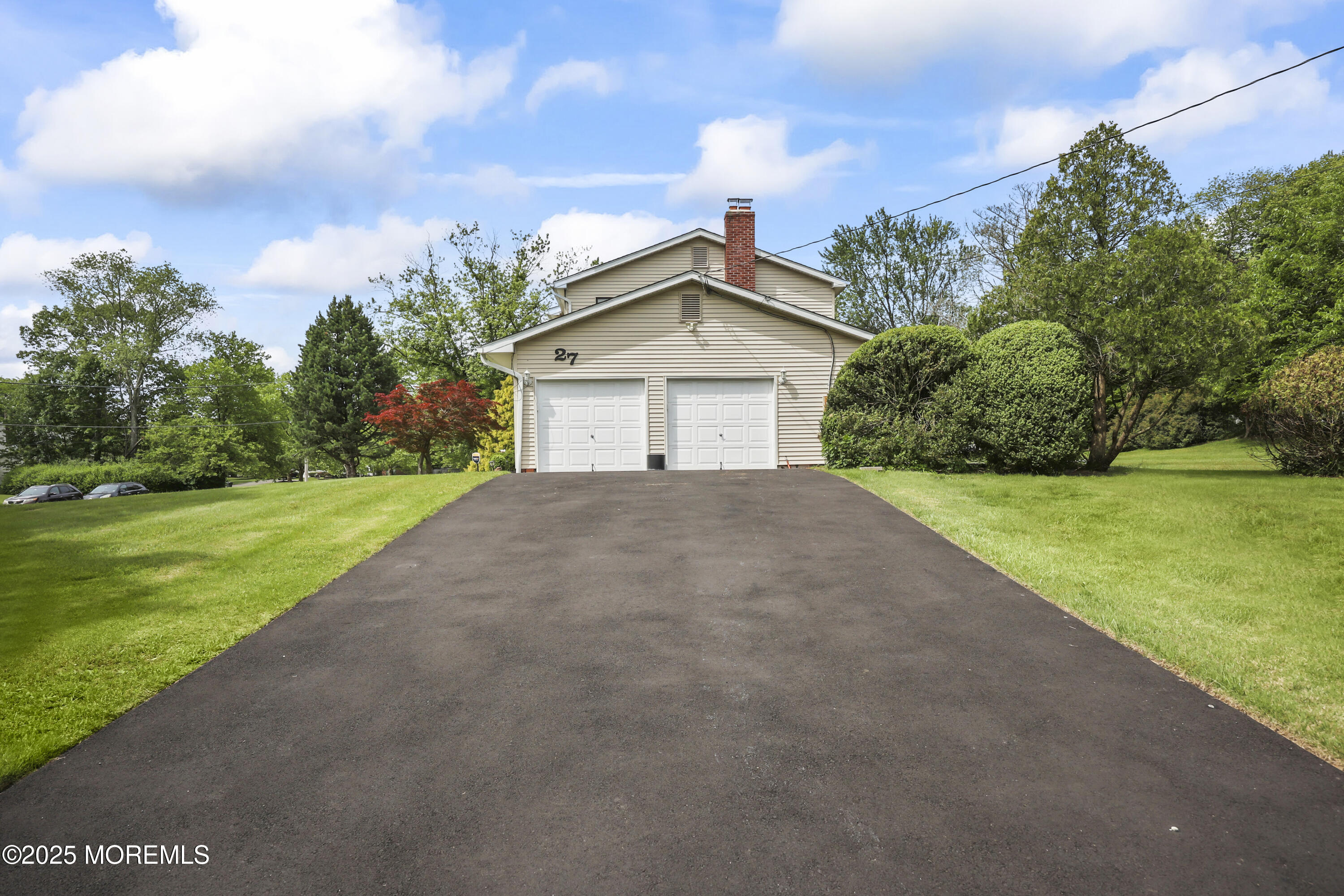 27 Sargent Road Freehold, NJ 07728 - Photo 5 of 47 a front view of a house with a yard