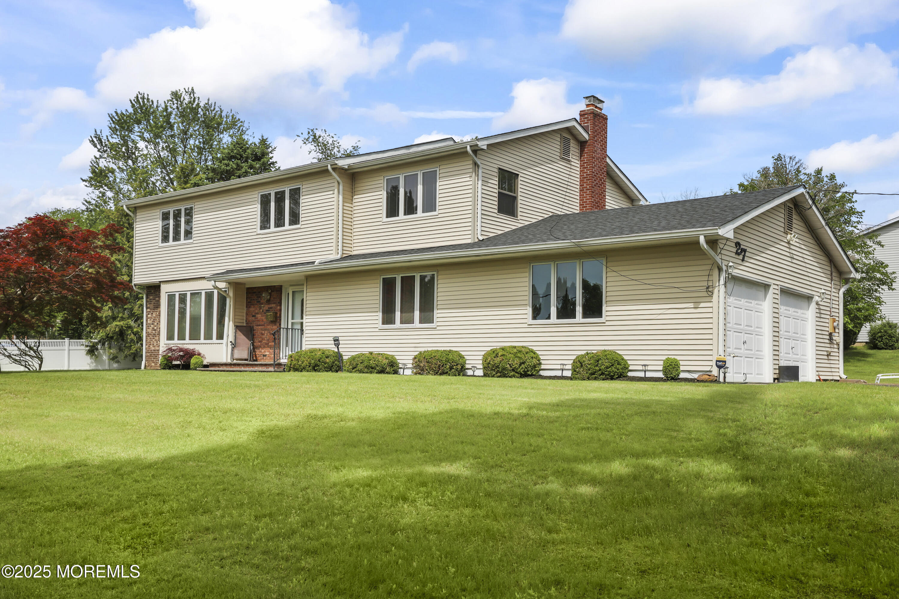 27 Sargent Road Freehold, NJ 07728 - Photo 6 of 47 a view of a yard in front of a house