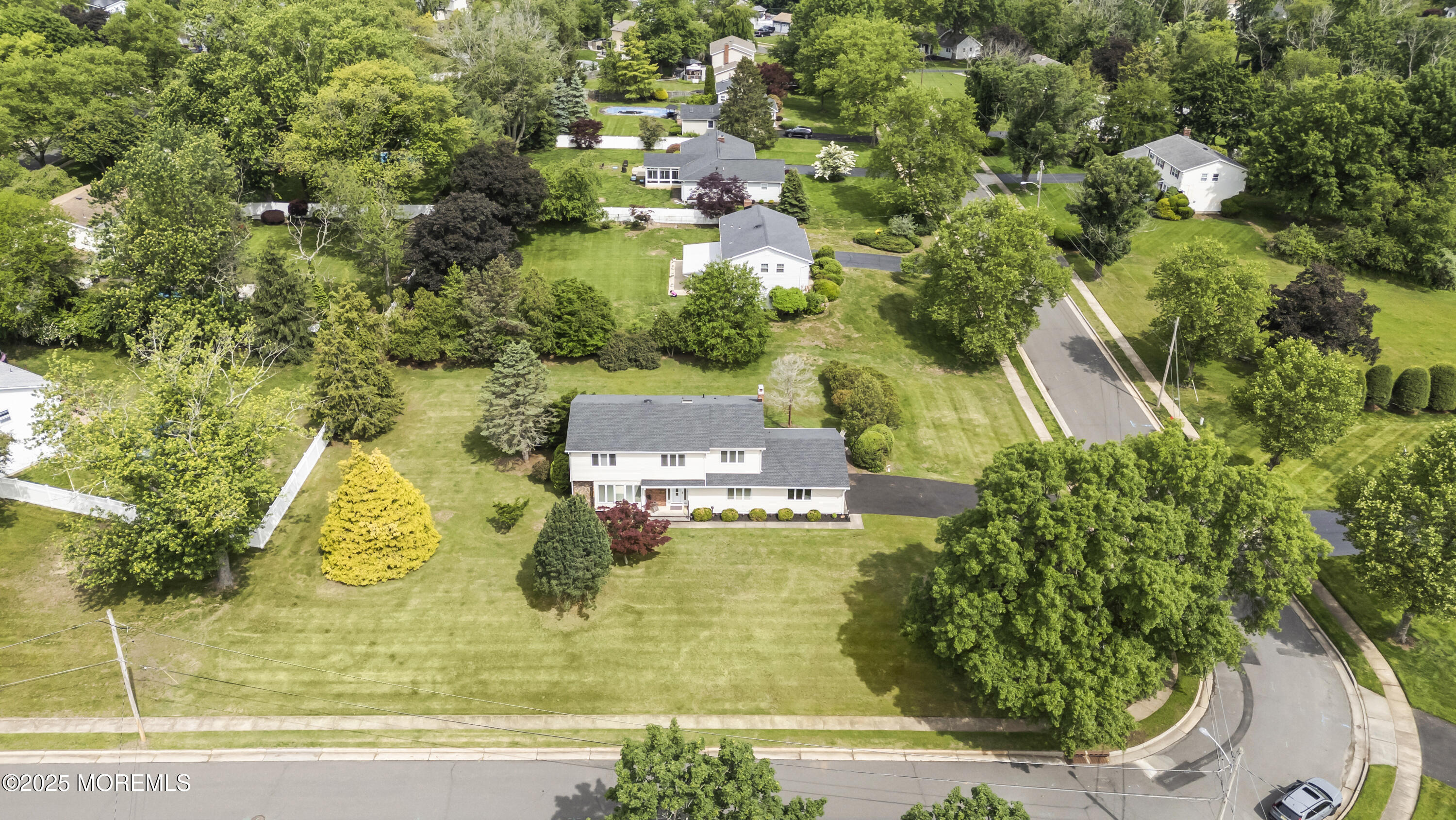 27 Sargent Road Freehold, NJ 07728 - Photo 7 of 47 an aerial view of residential houses with yard