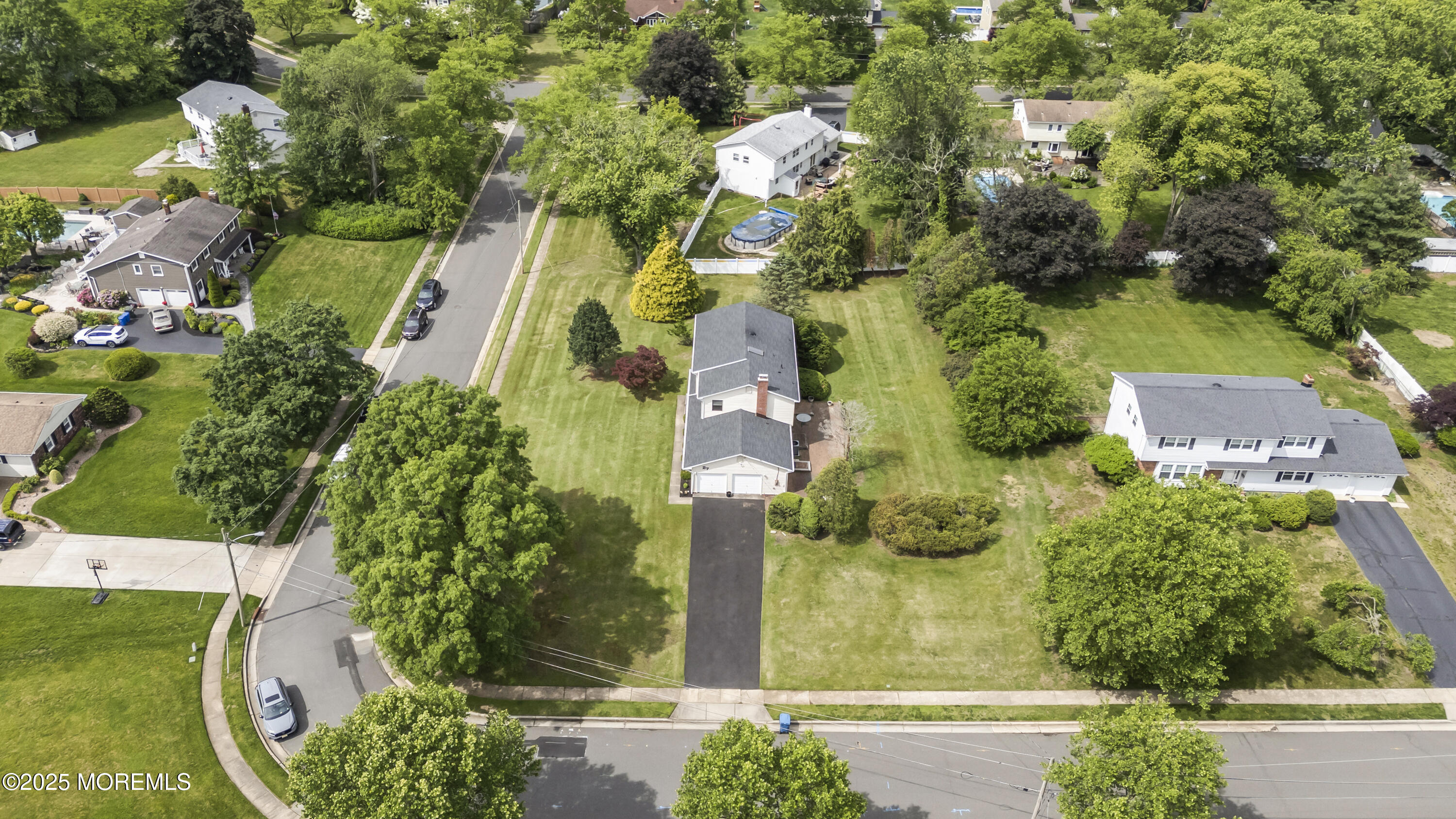 27 Sargent Road Freehold, NJ 07728 - Photo 8 of 47 an aerial view of a house