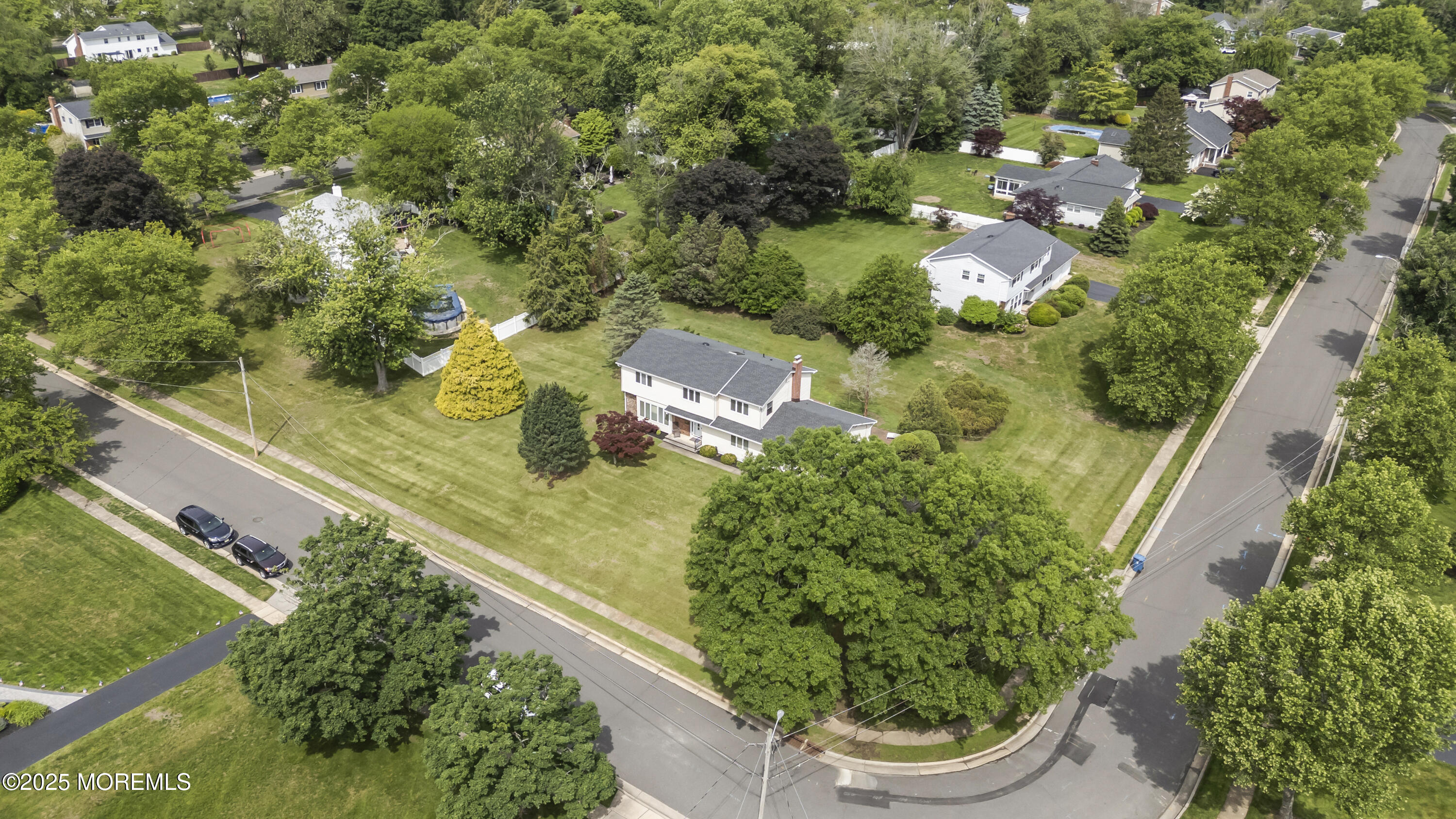 27 Sargent Road Freehold, NJ 07728 - Photo 9 of 47 an aerial view of a house with a garden