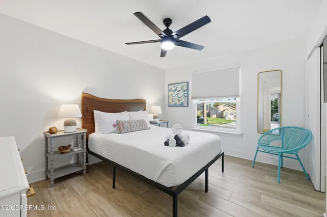 a outdoor seating area with a table and chairs