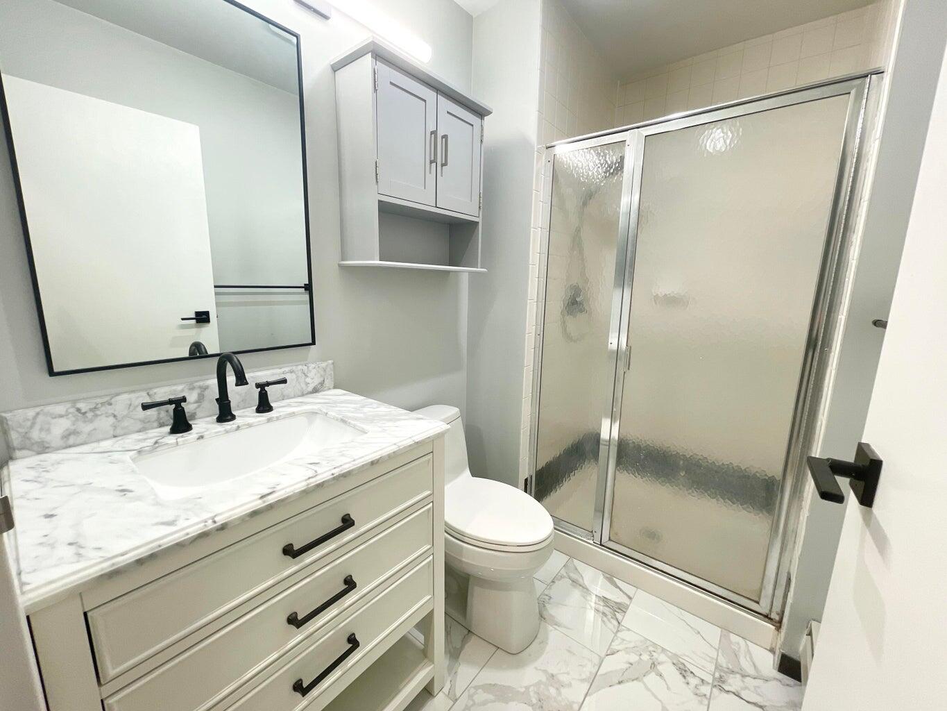 234 North Broadway, Unit 217 Milwaukee, WI 53202 - Photo 2 of 17 Primary Bathroom