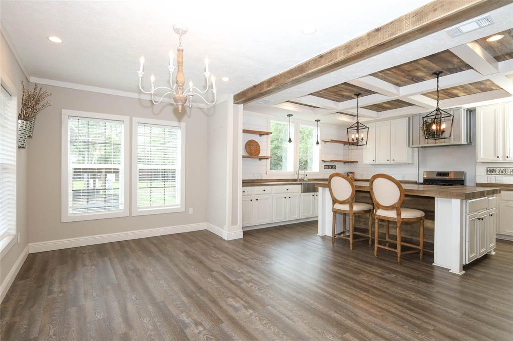 2269 Mullet Lake Park Road Geneva, FL 32732 - Photo 12 of 76 a kitchen with stainless steel appliances granite countertop a stove a sink and a microwave