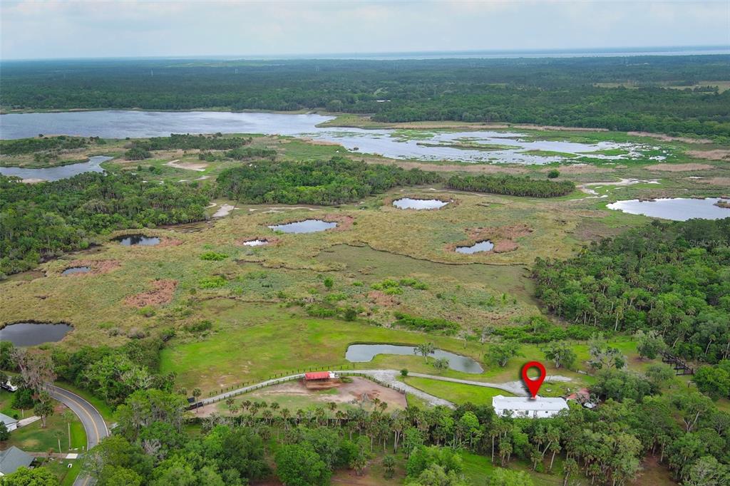 2269 Mullet Lake Park Road Geneva, FL 32732 - Photo 2 of 76 a view of an ocean and beach