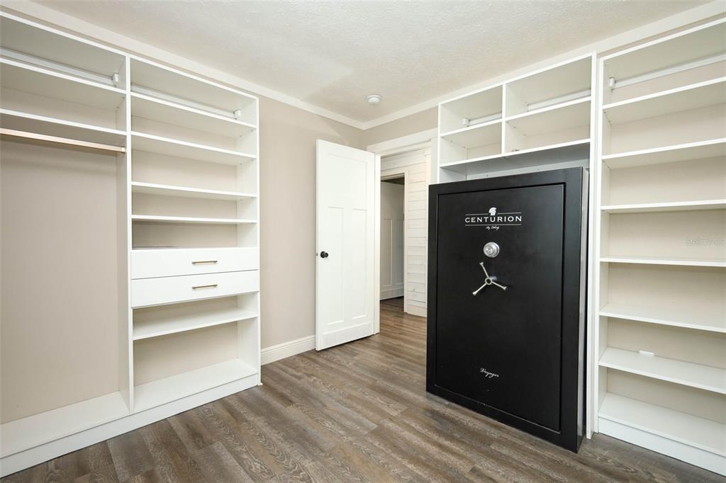 2269 Mullet Lake Park Road Geneva, FL 32732 - Photo 37 of 76 a view of closet area with empty racks