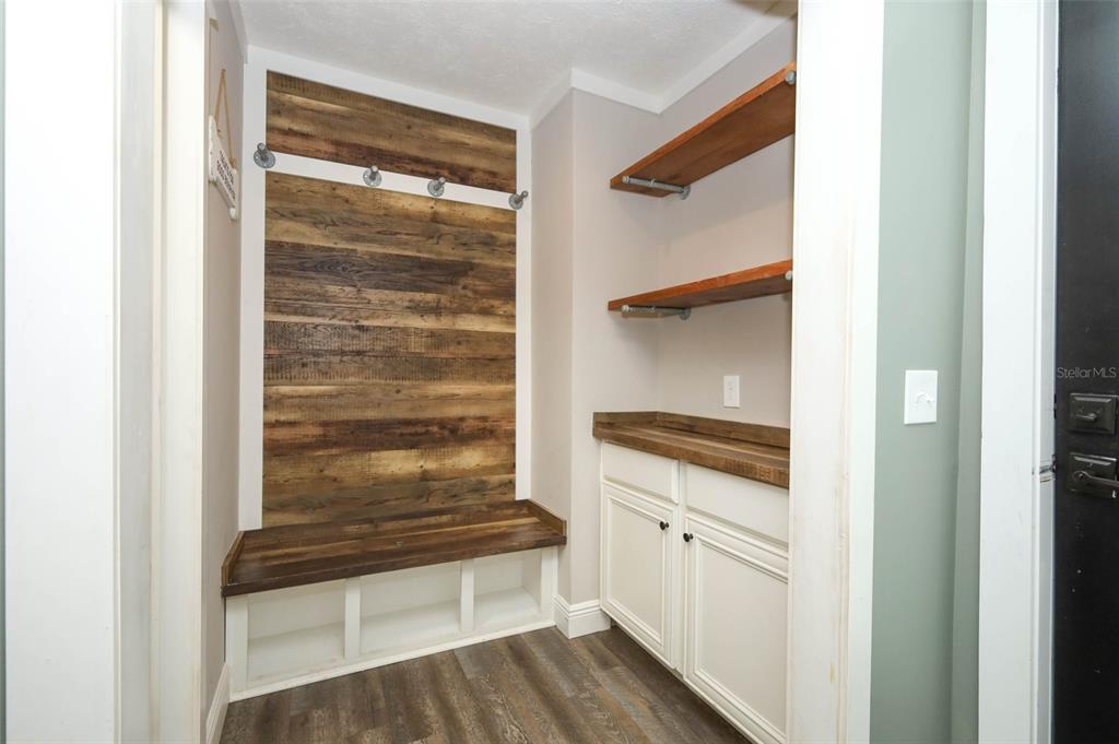 2269 Mullet Lake Park Road Geneva, FL 32732 - Photo 38 of 76 a view of walk in closet with empty racks