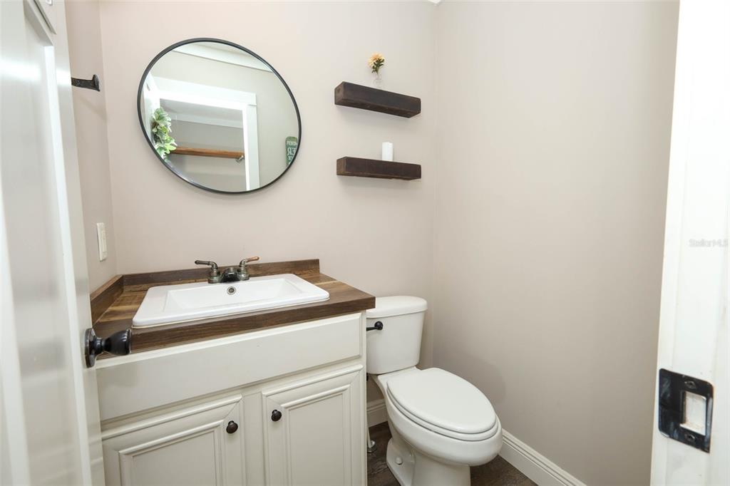 2269 Mullet Lake Park Road Geneva, FL 32732 - Photo 40 of 76 a bathroom with a sink and a mirror