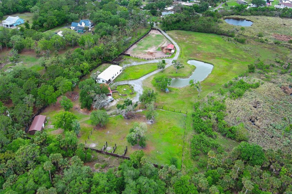 2269 Mullet Lake Park Road Geneva, FL 32732 - Photo 65 of 76 an aerial view of residential house with outdoor space and swimming pool