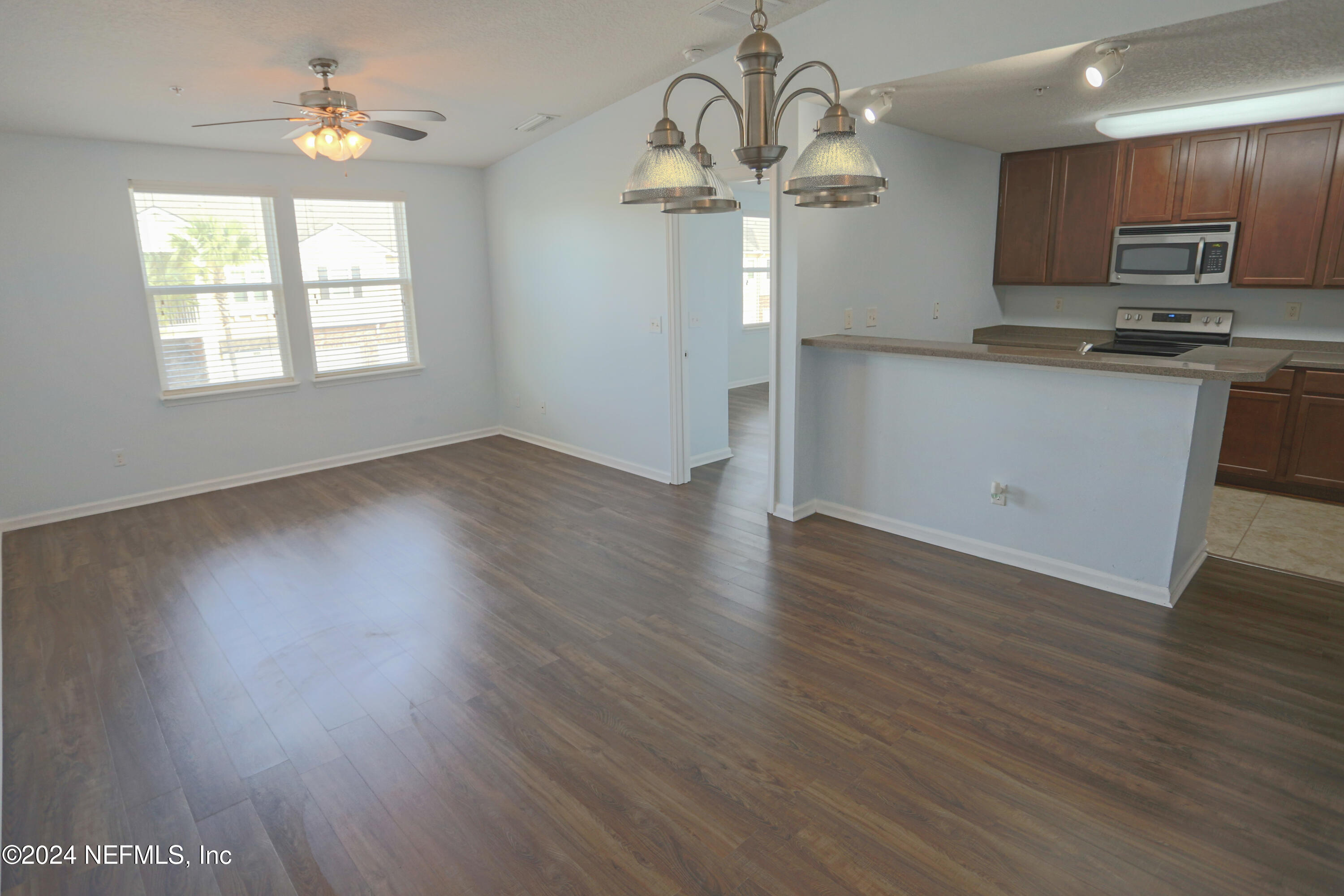 914 Golden Lake Loop St. Augustine, FL 32084 - Photo 11 of 37 Dining Room Living Room and Kitchen