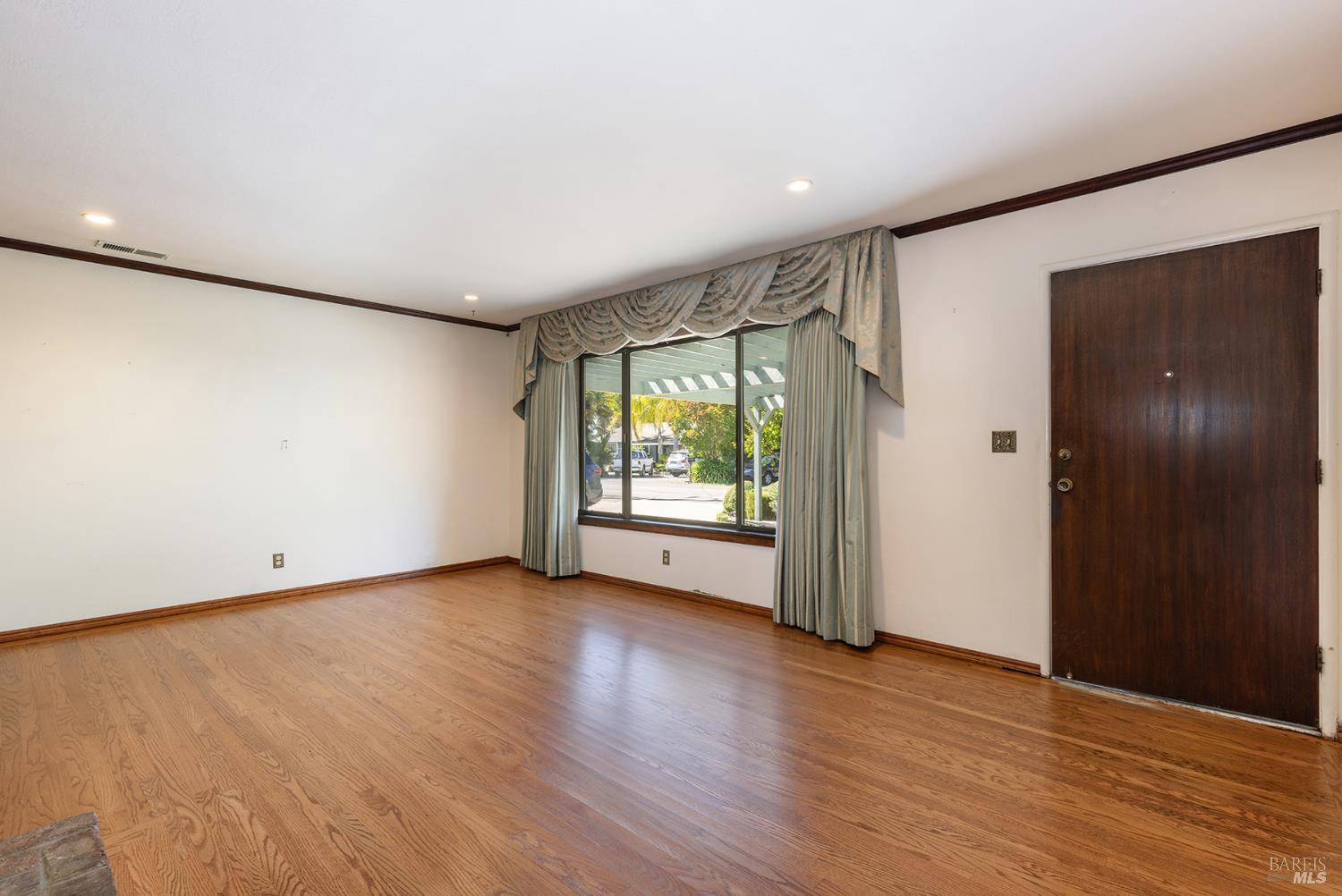2236 West Hearn Avenue Santa Rosa, CA 95407 - Photo 13 of 56 an empty room with wooden floor and windows