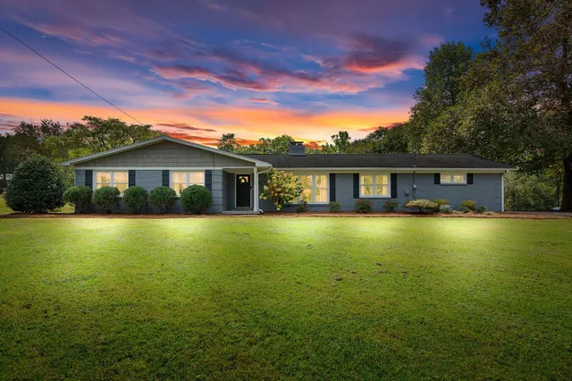 a front view of house with swimming pool