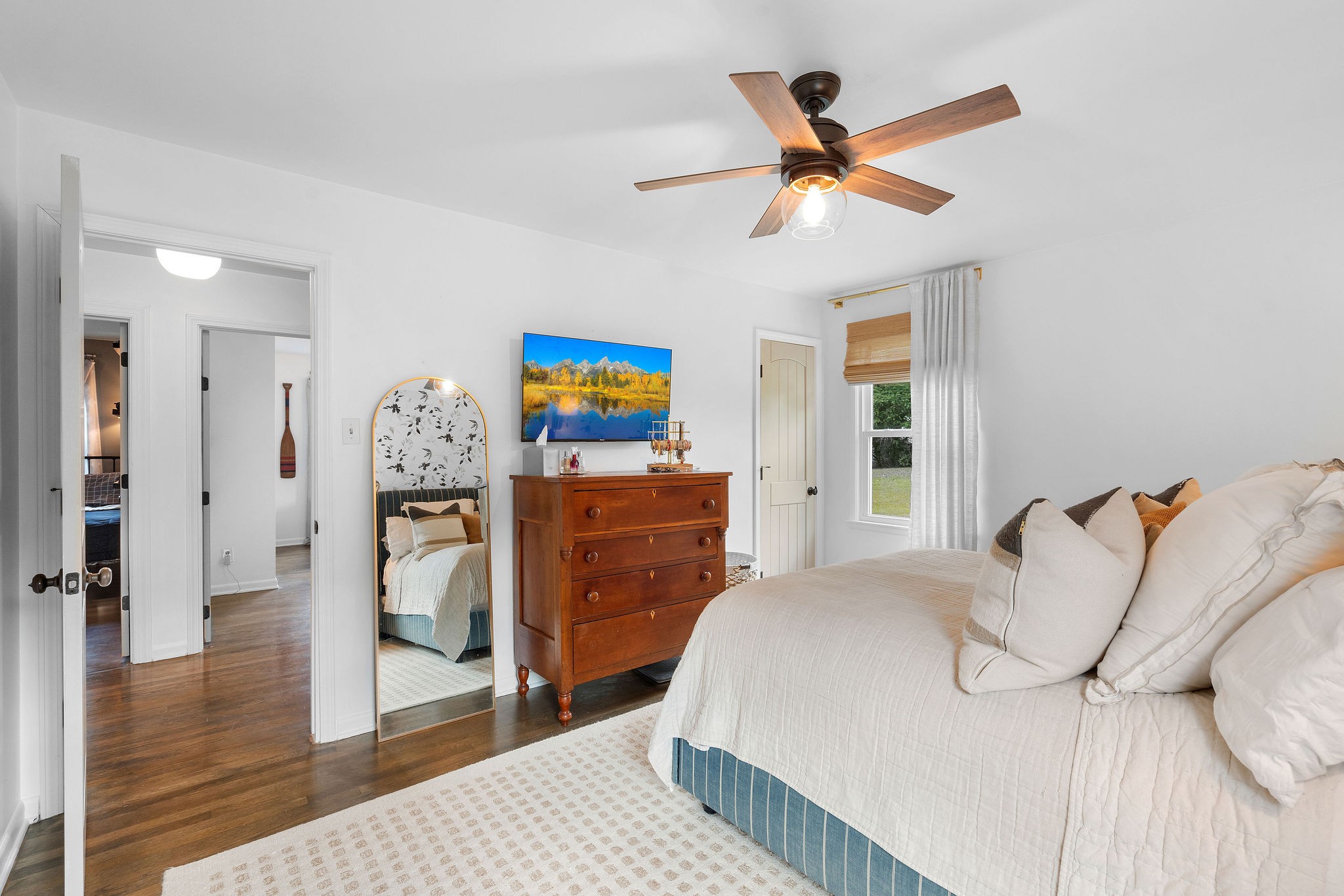 2337 Les Robinson Road Columbia, TN 38401 - Photo 20 of 42 a bedroom with a bed and a ceiling fan