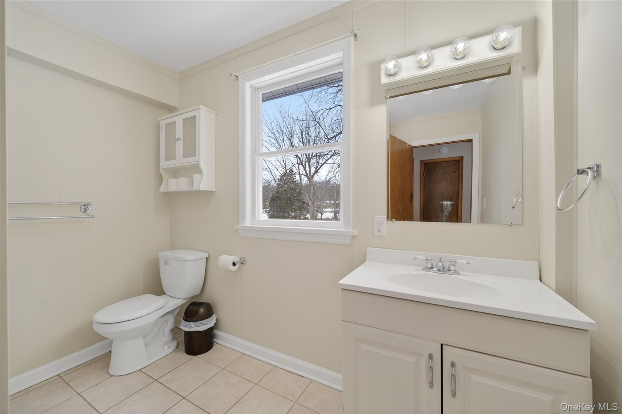 408 Bull Mill Road, Unit 2 Chester, NY 10918 - Photo 13 of 29 a bathroom with a toilet sink and mirror