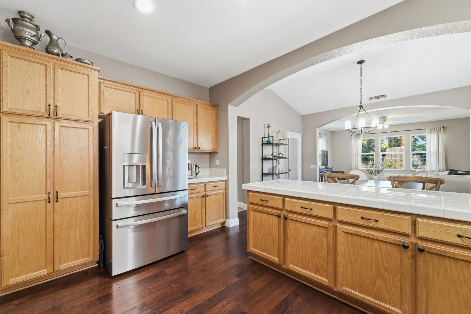 2220 Ellison Drive Modesto, CA 95355 - Photo 11 of 53 a kitchen with stainless steel appliances a refrigerator sink and cabinets