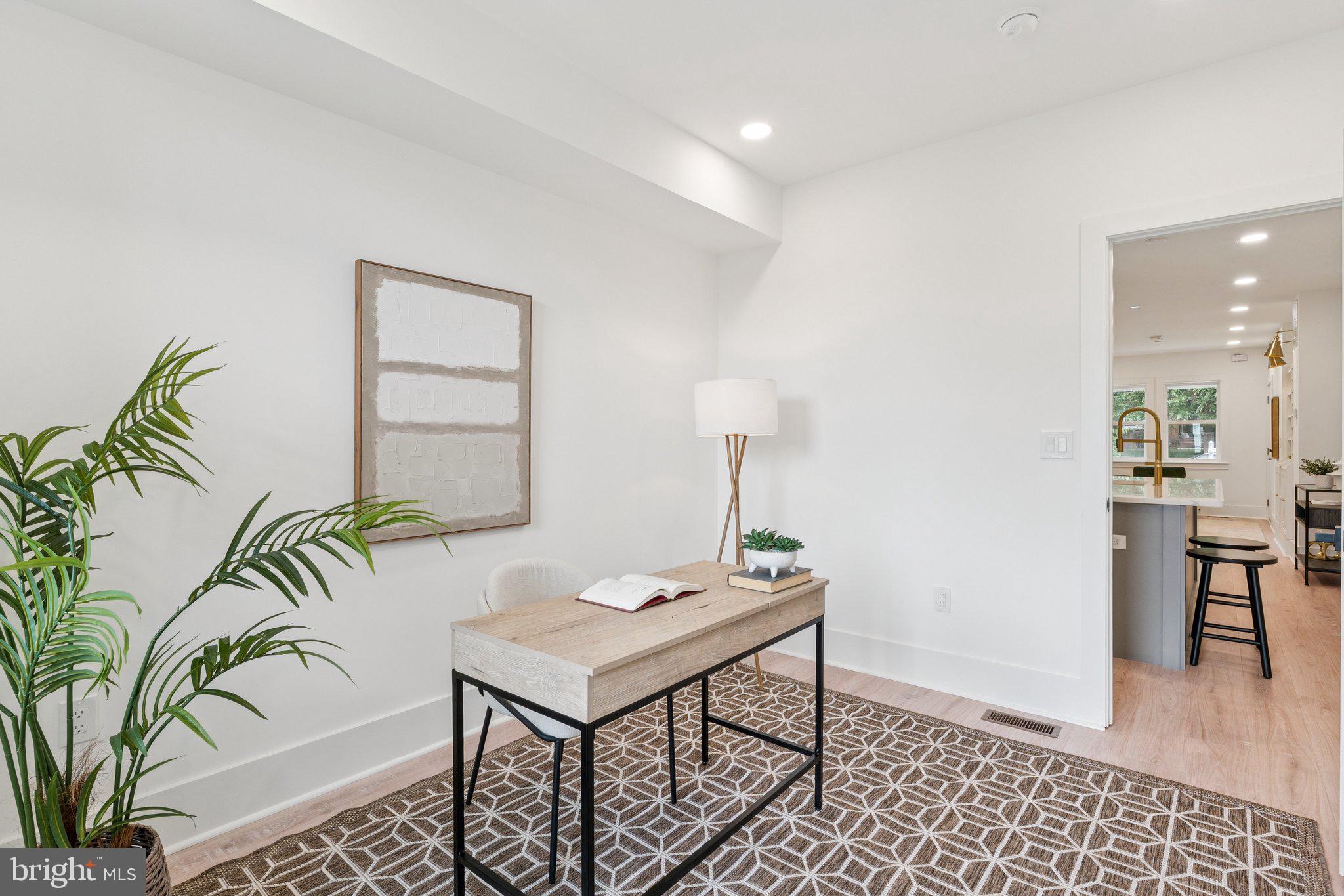 2608 4th Street Northeast, Unit 1 Washington, DC 20002 - Photo 11 of 27 a view of a hallway with furniture and rug