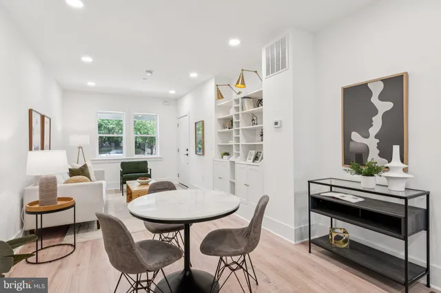 a view of a livingroom with furniture and a table