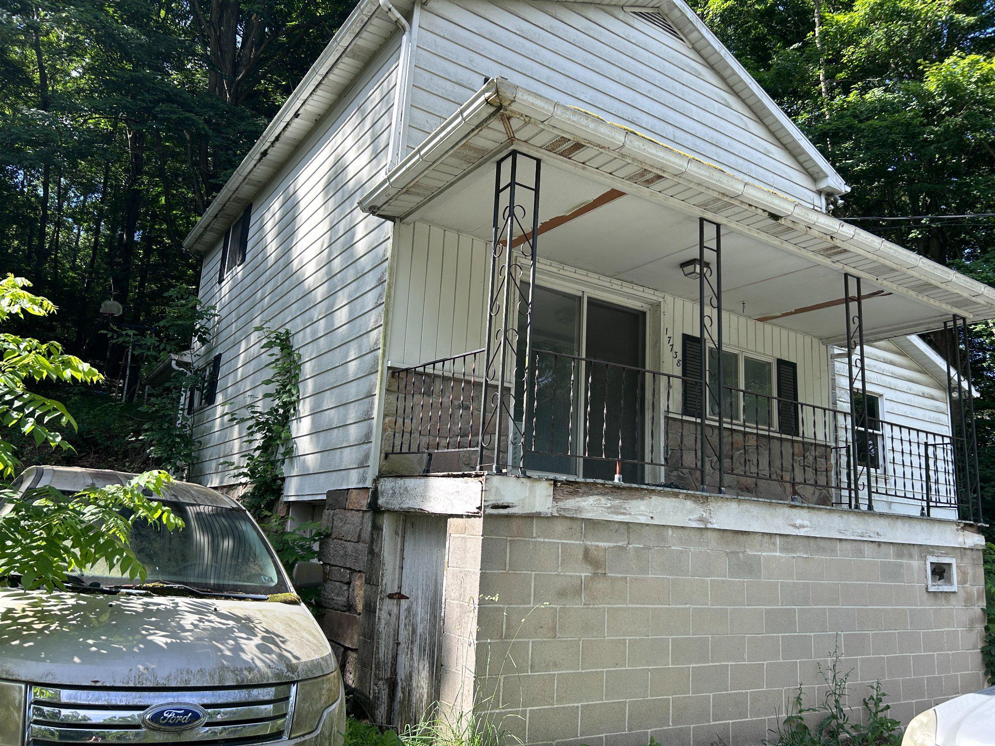 17738 Amberson Road Spring Run, PA 17262 - Photo 1 of 23 a view of a white house with many windows