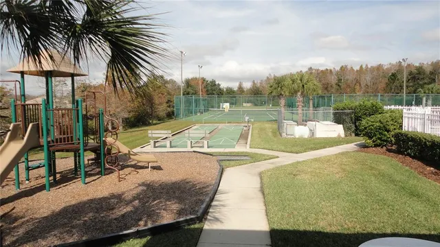 a view of a balcony with floor to ceiling window and outdoor space