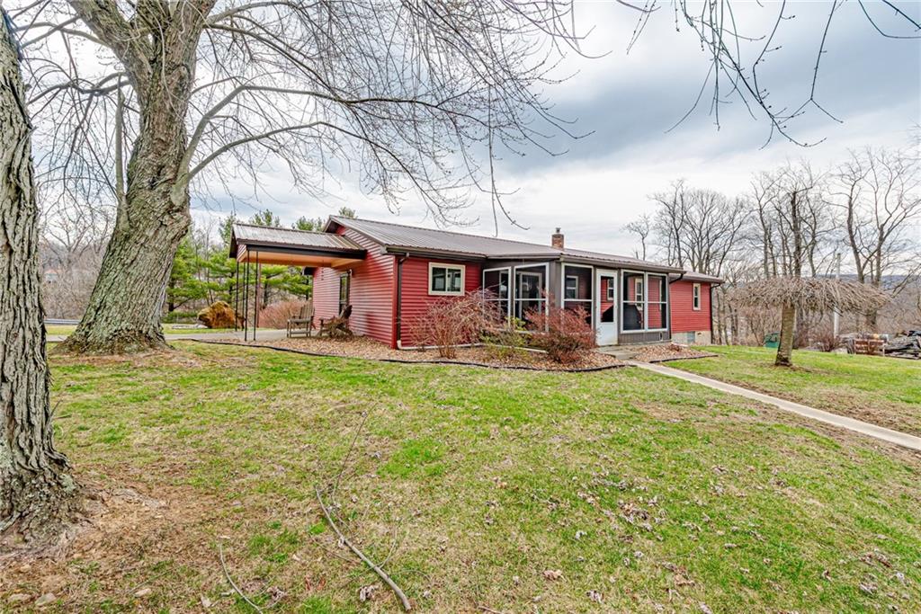 175 Mt Joy Road Mount Pleasant, PA 15666 - Photo 11 of 38 a view of a house with a backyard