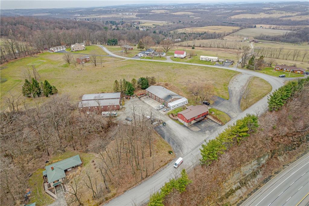 175 Mt Joy Road Mount Pleasant, PA 15666 - Photo 3 of 38 an aerial view of residential houses with outdoor space