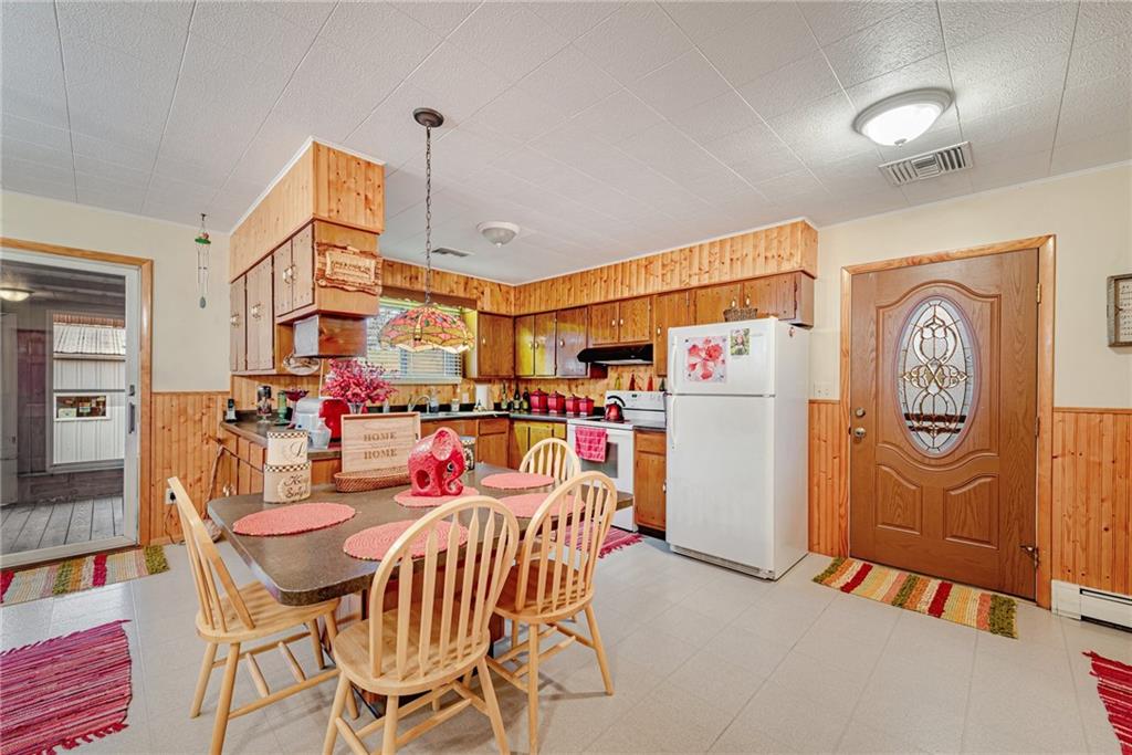 175 Mt Joy Road Mount Pleasant, PA 15666 - Photo 32 of 38 a dining room with a table and chairs