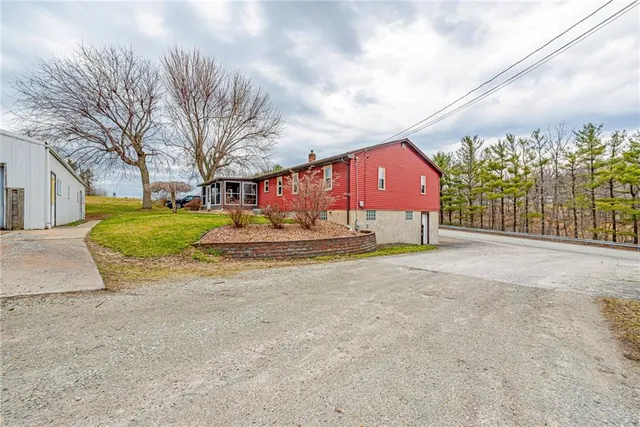a view of road with large trees