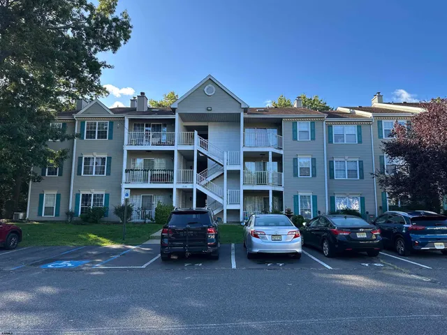 a car parked in front of a house