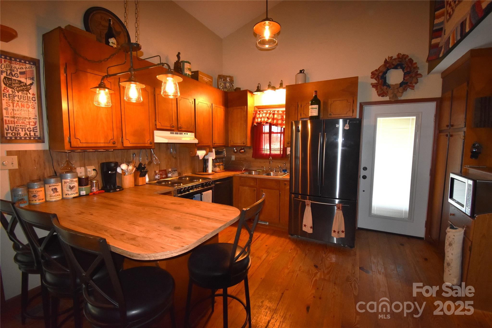 5769 Birch Street Conover, NC 28613 - Photo 12 of 45 a view of a dining room with furniture and a chandelier