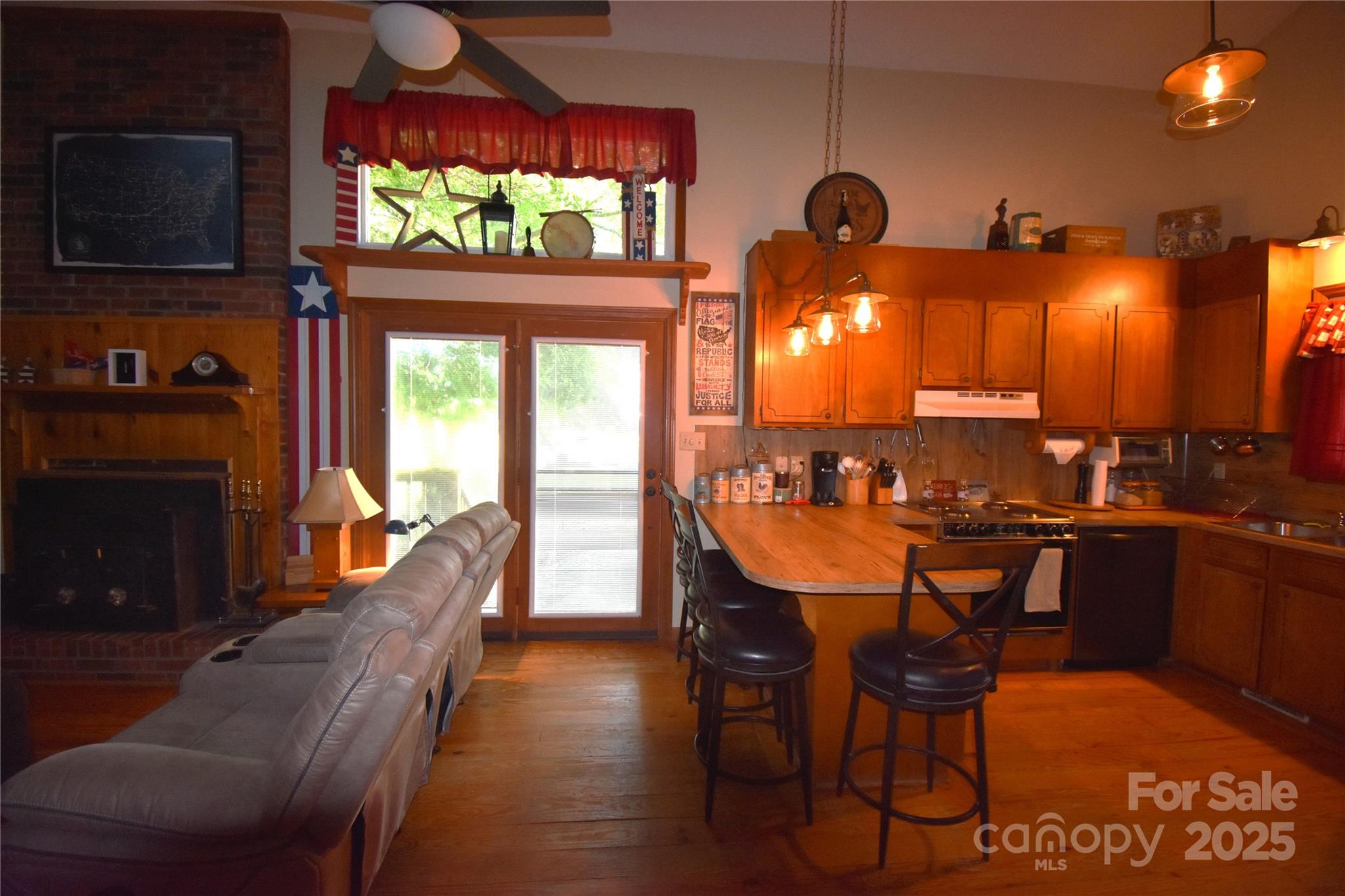 5769 Birch Street Conover, NC 28613 - Photo 13 of 45 a view of a dining room with furniture window and wooden floor