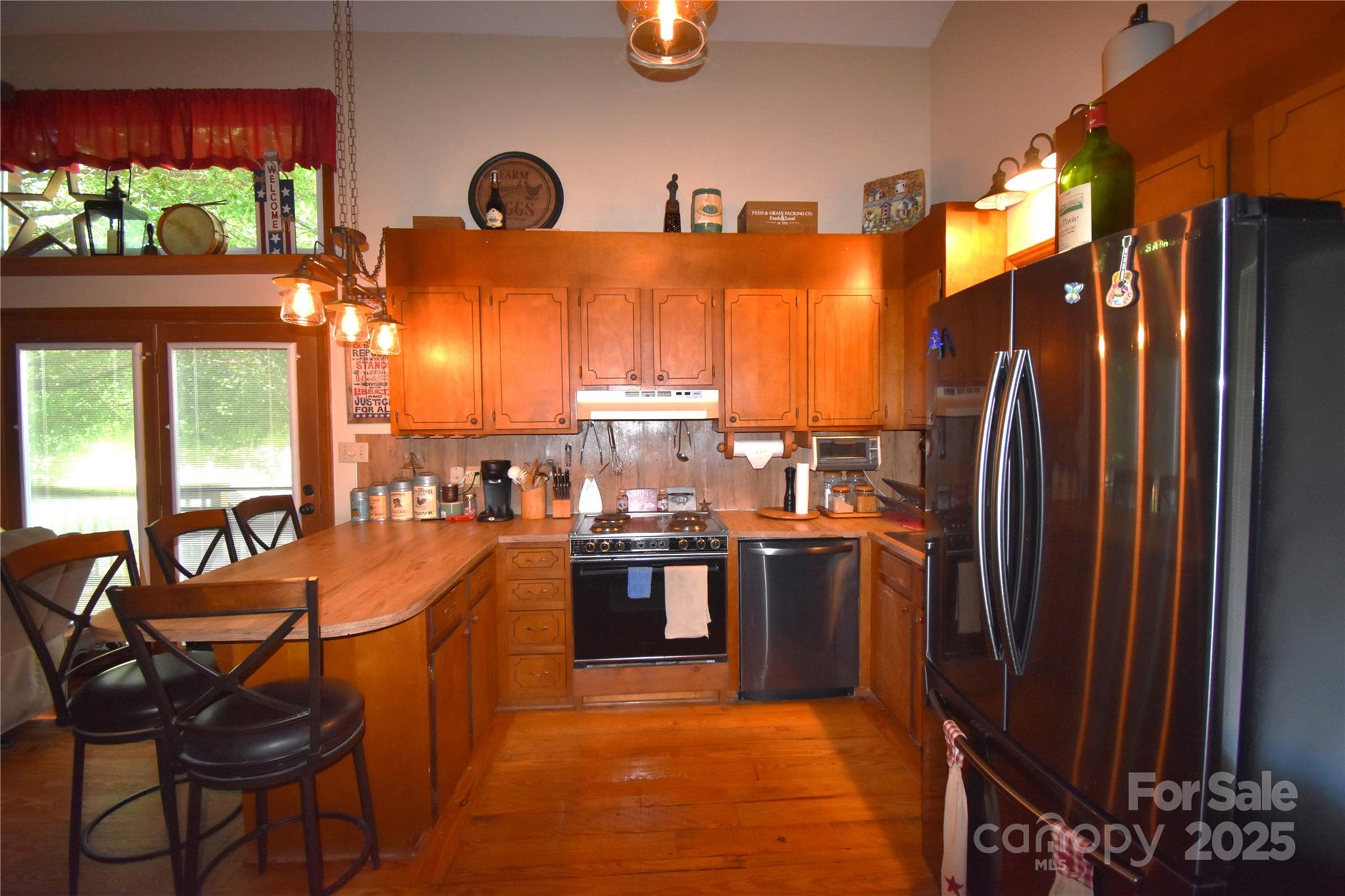 5769 Birch Street Conover, NC 28613 - Photo 14 of 45 a kitchen with stainless steel appliances granite countertop a refrigerator and a sink