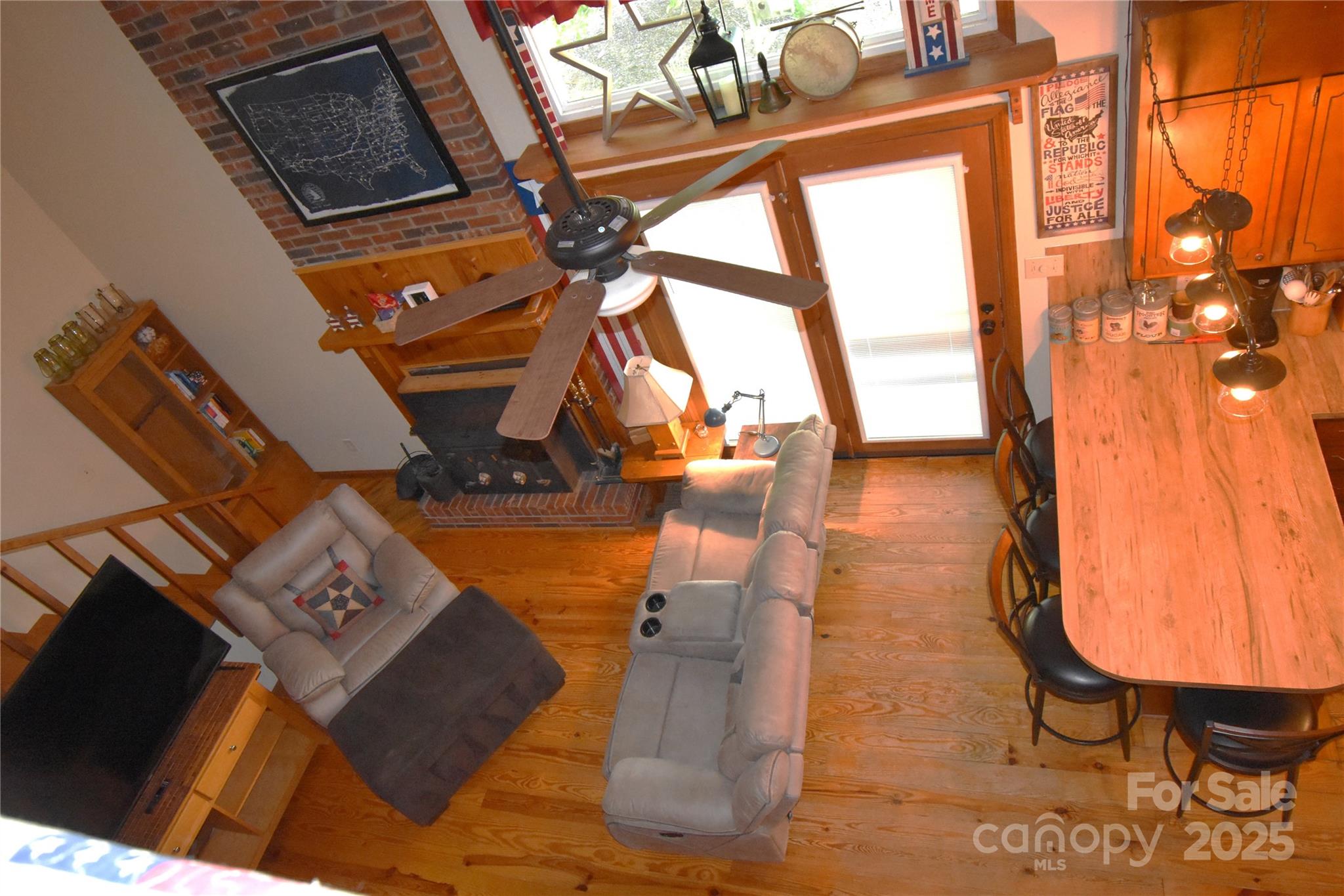 5769 Birch Street Conover, NC 28613 - Photo 16 of 45 a view of living room with a sink and wooden floor