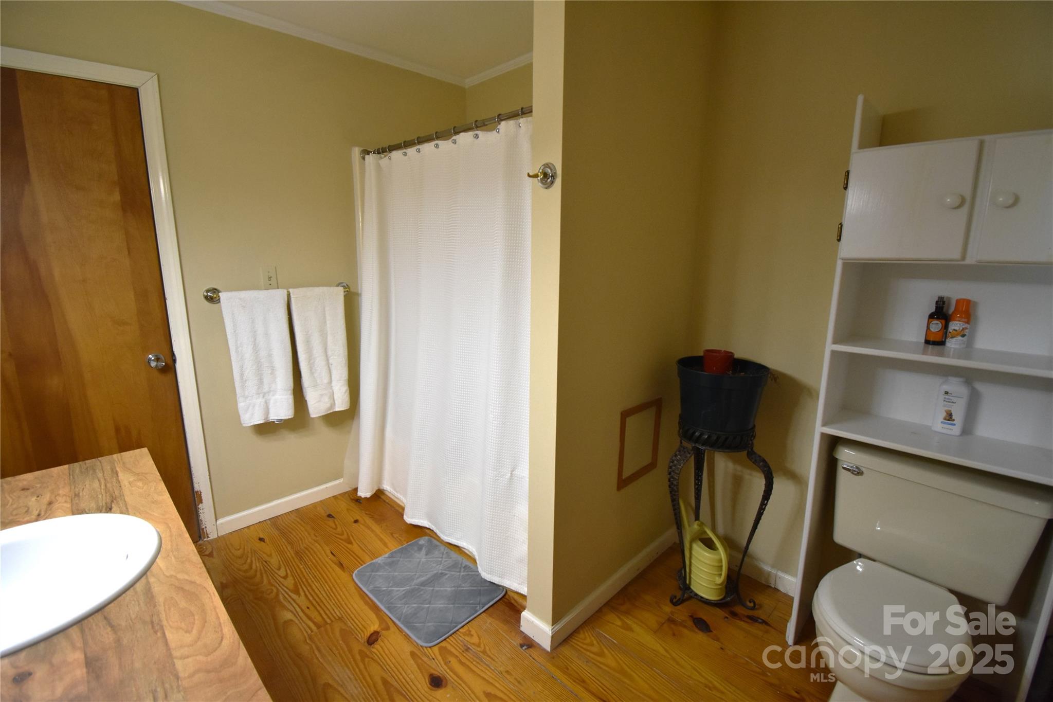 5769 Birch Street Conover, NC 28613 - Photo 19 of 45 a view of room with furniture and wooden floor