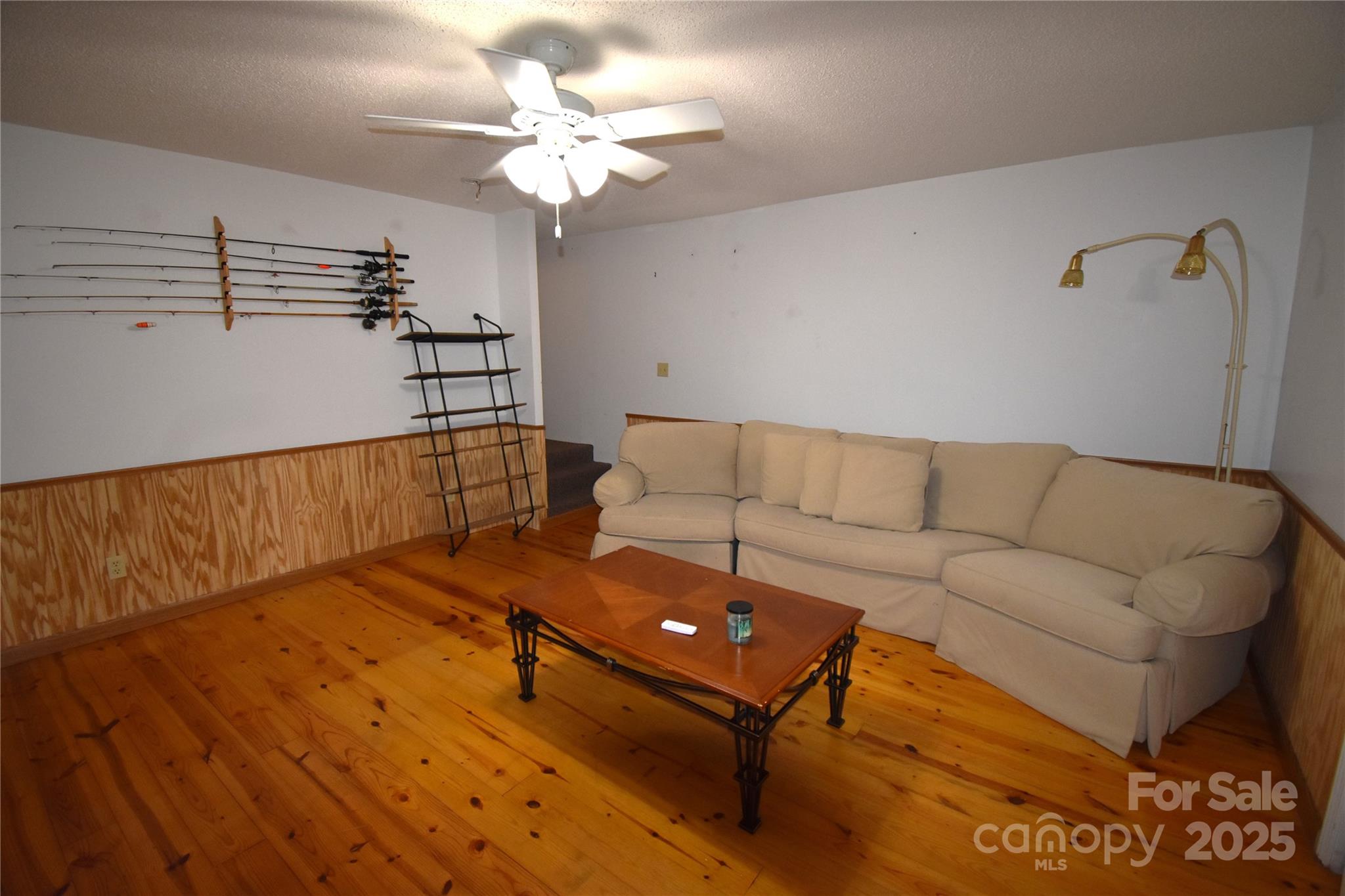 5769 Birch Street Conover, NC 28613 - Photo 28 of 45 a living room with furniture and a chandelier
